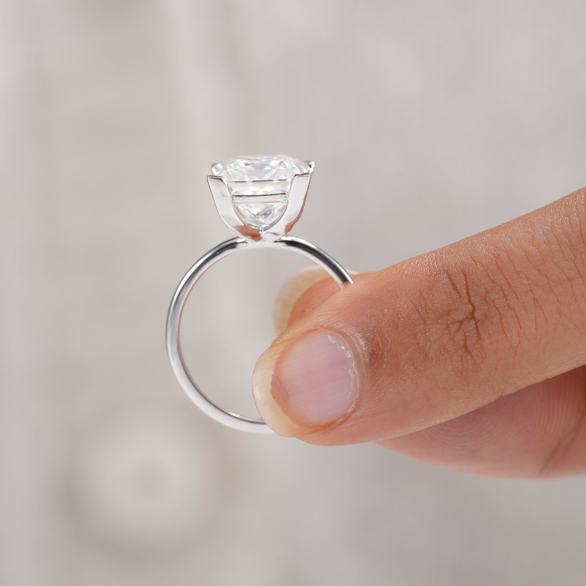 Classic solitaire ring featuring princess lab grown diamond.