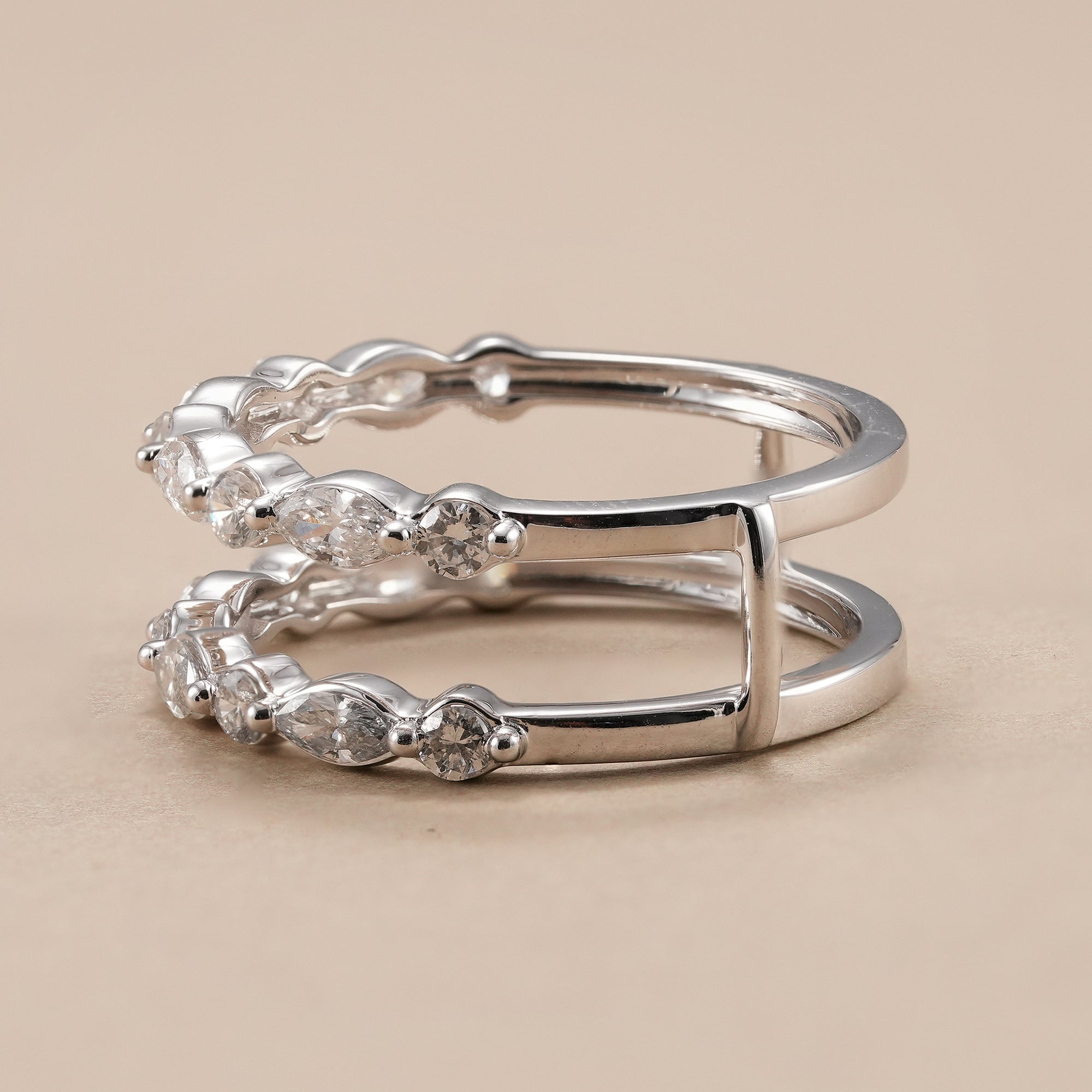 Curved bridal ring enhancer with marquise and round lab diamonds.
