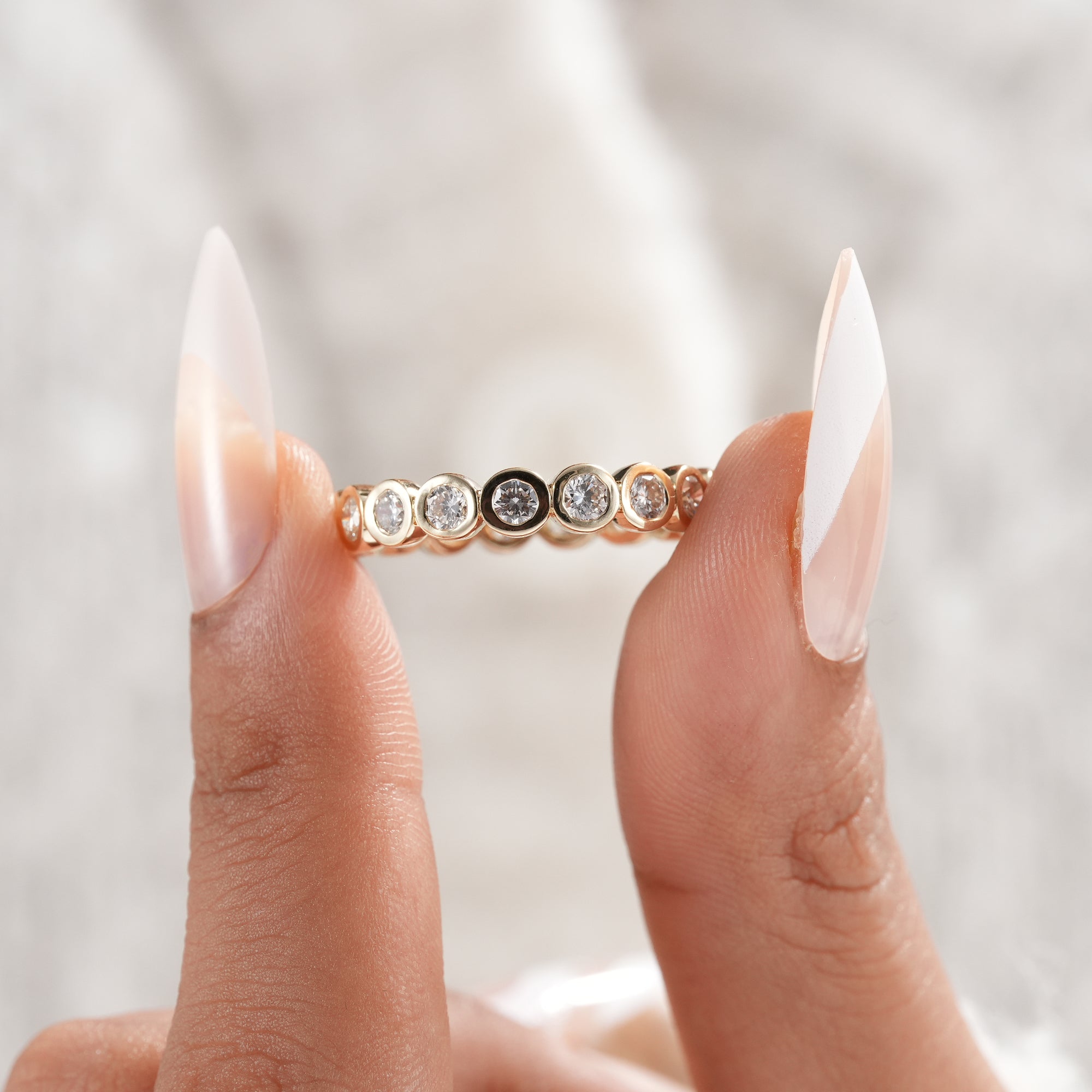 Fine jewelry round diamond eternity wedding band.