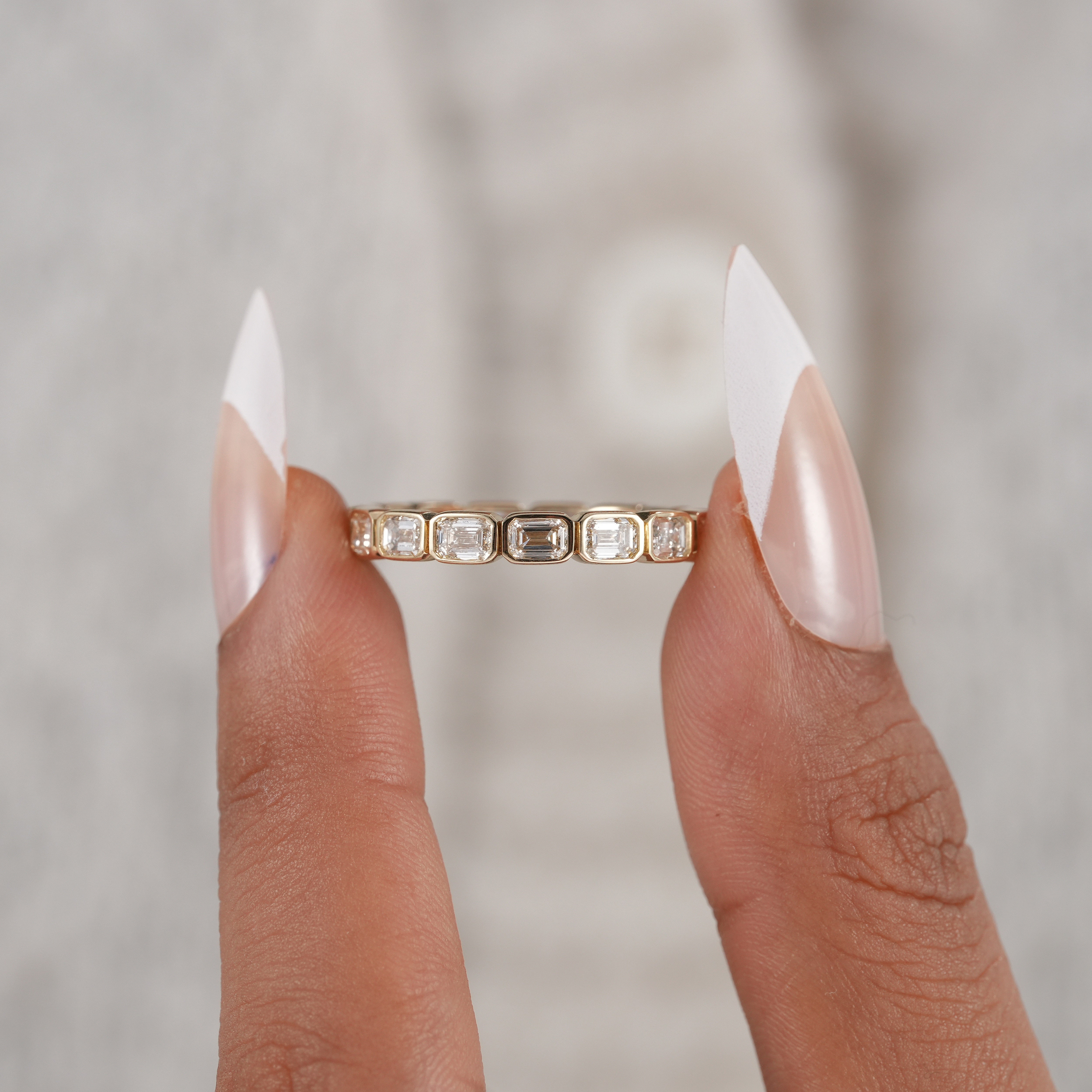 Luxury emerald cut diamond stackable band.