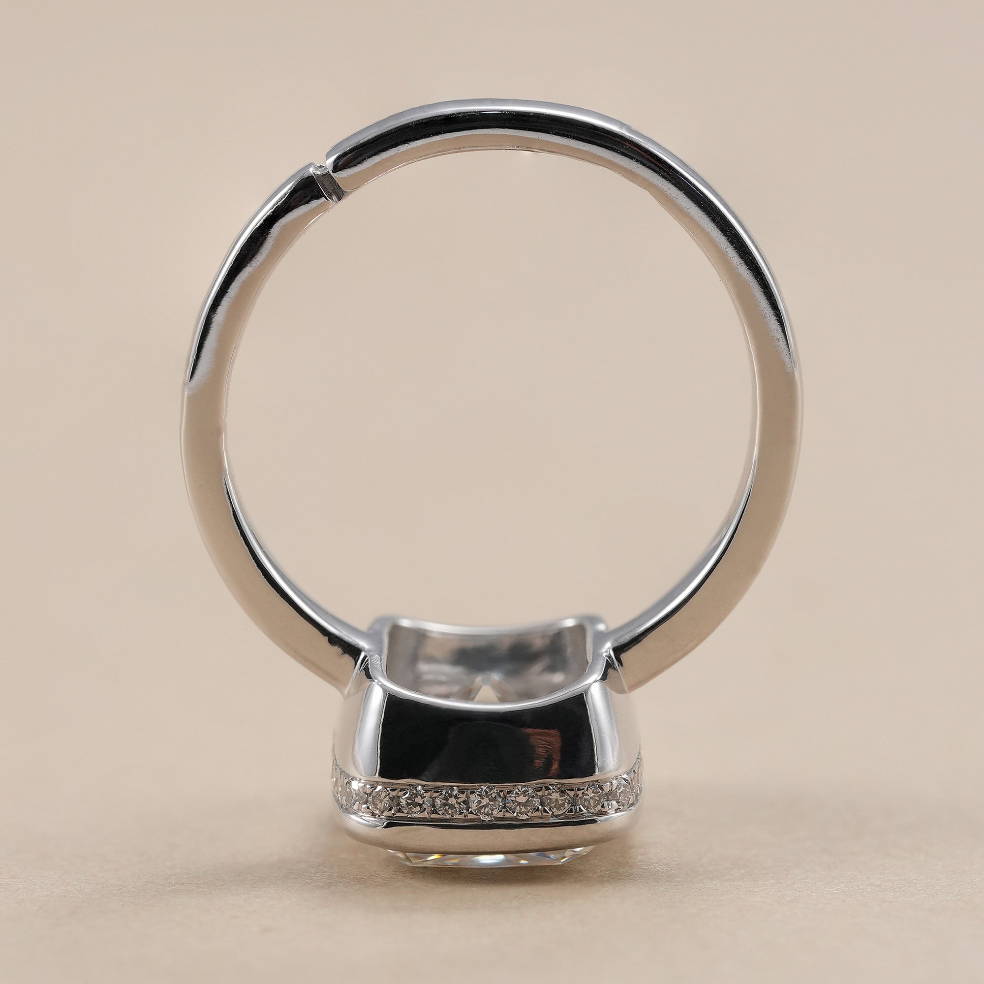 Hidden halo cushion lab diamond ring for women.