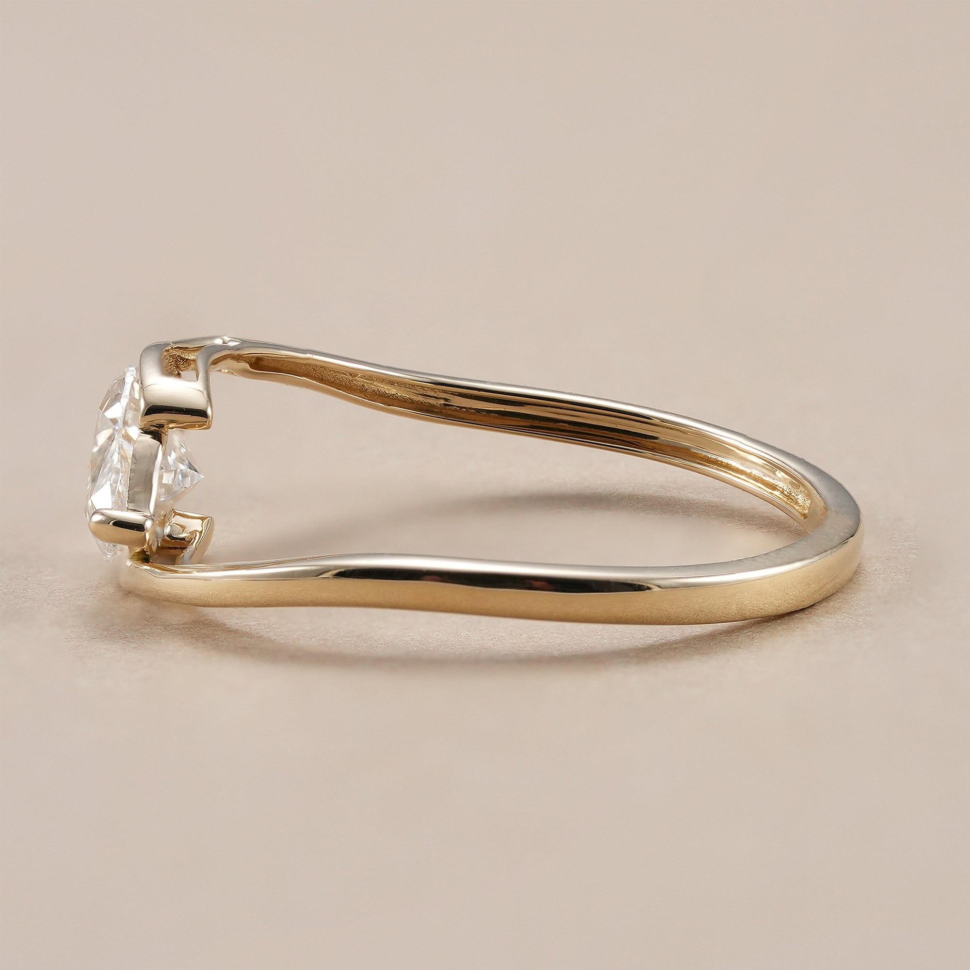 IGI certified marquise lab grown diamond engagement ring.