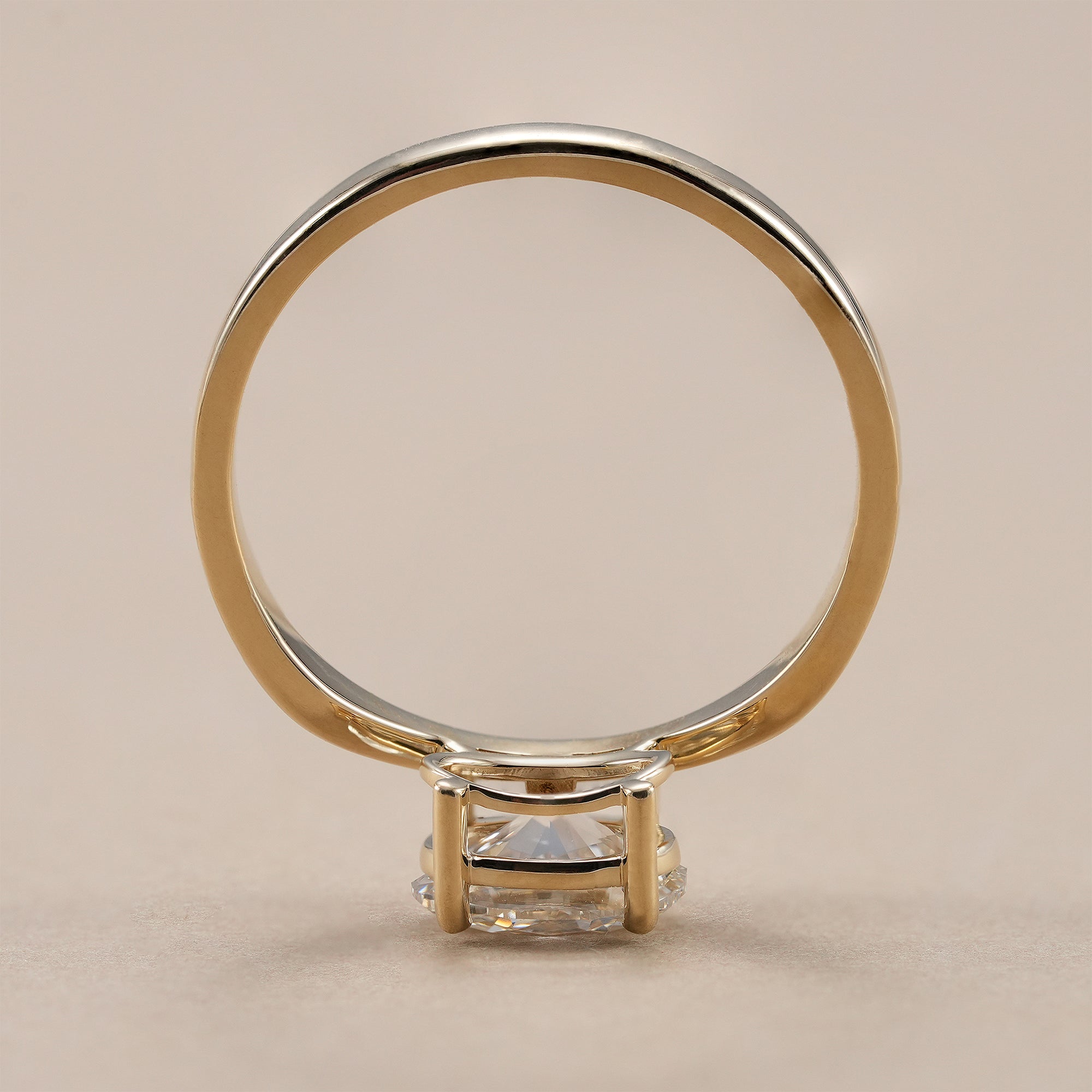 Minimalist oval lab grown diamond bridal ring.