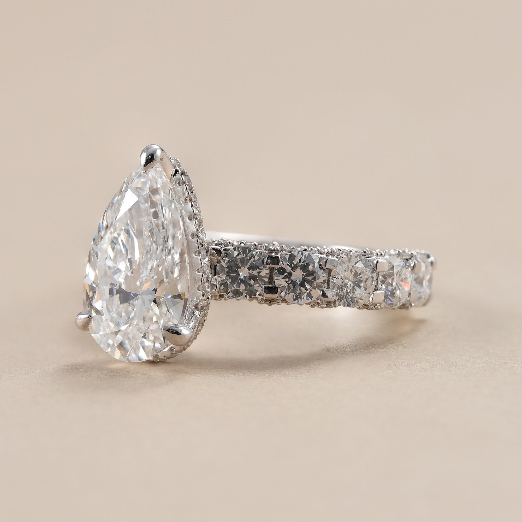 IGI certified pear lab diamond engagement ring in white gold.