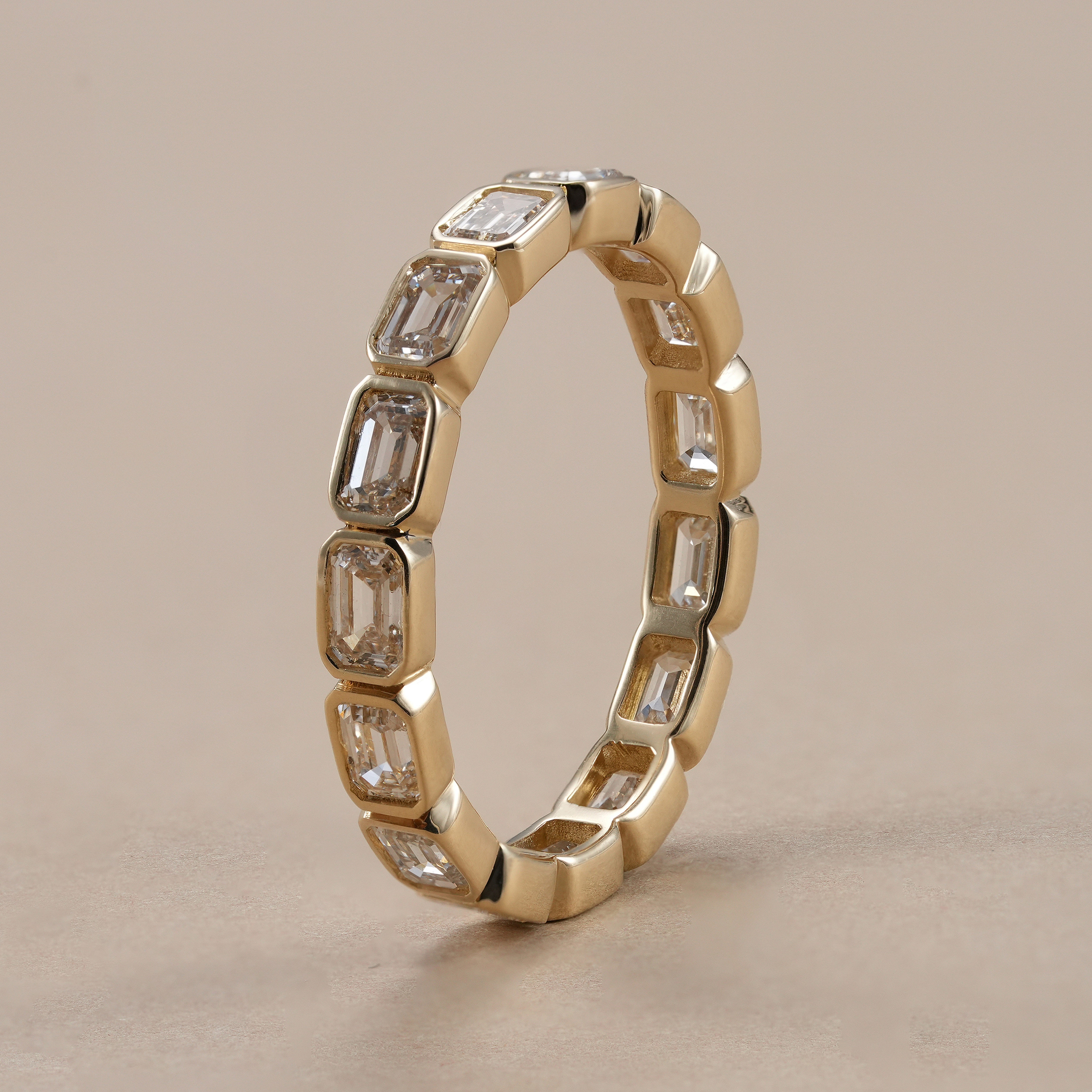 Minimalist emerald cut lab diamond stackable ring.