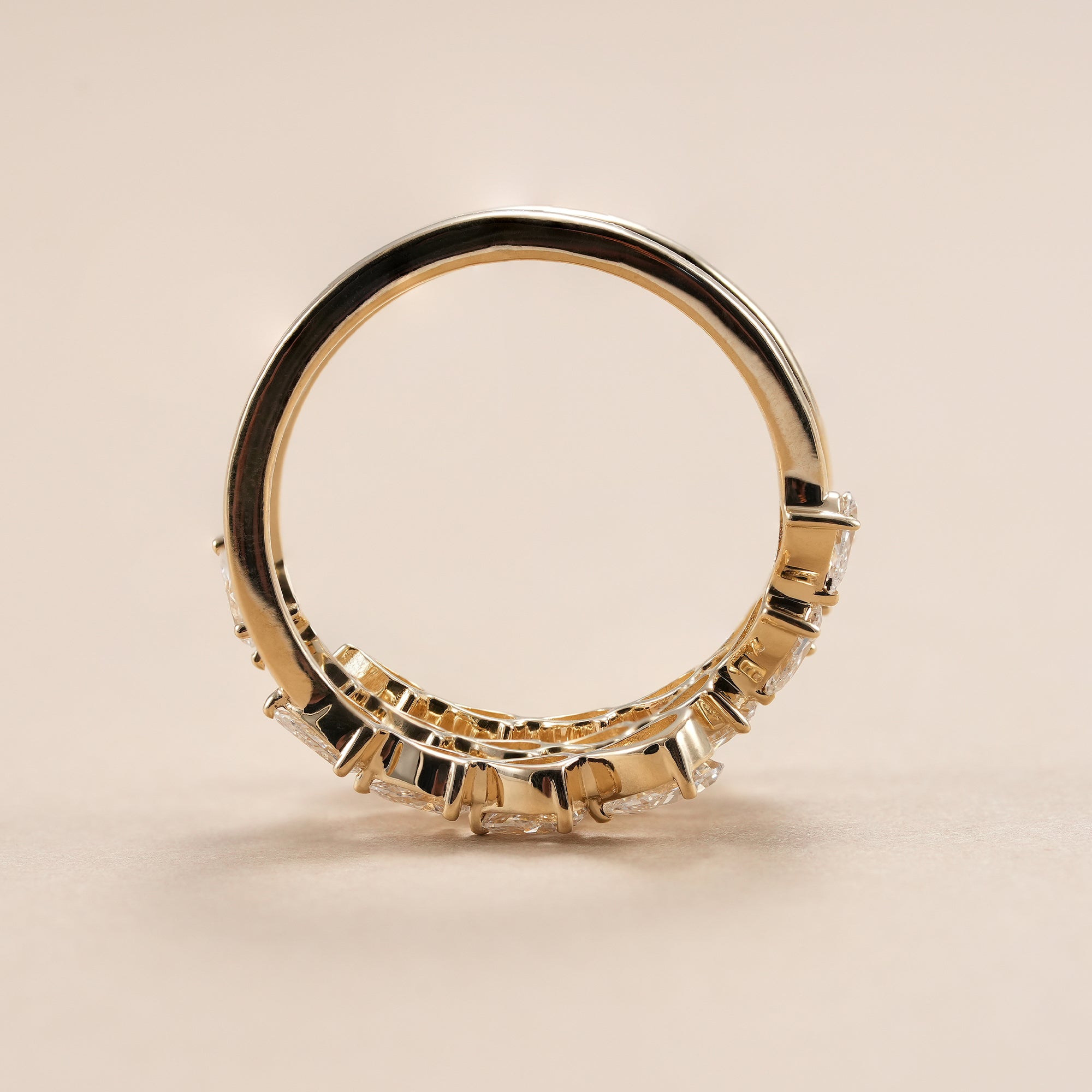 Lab grown pear diamond stackable ring in 14K yellow gold.