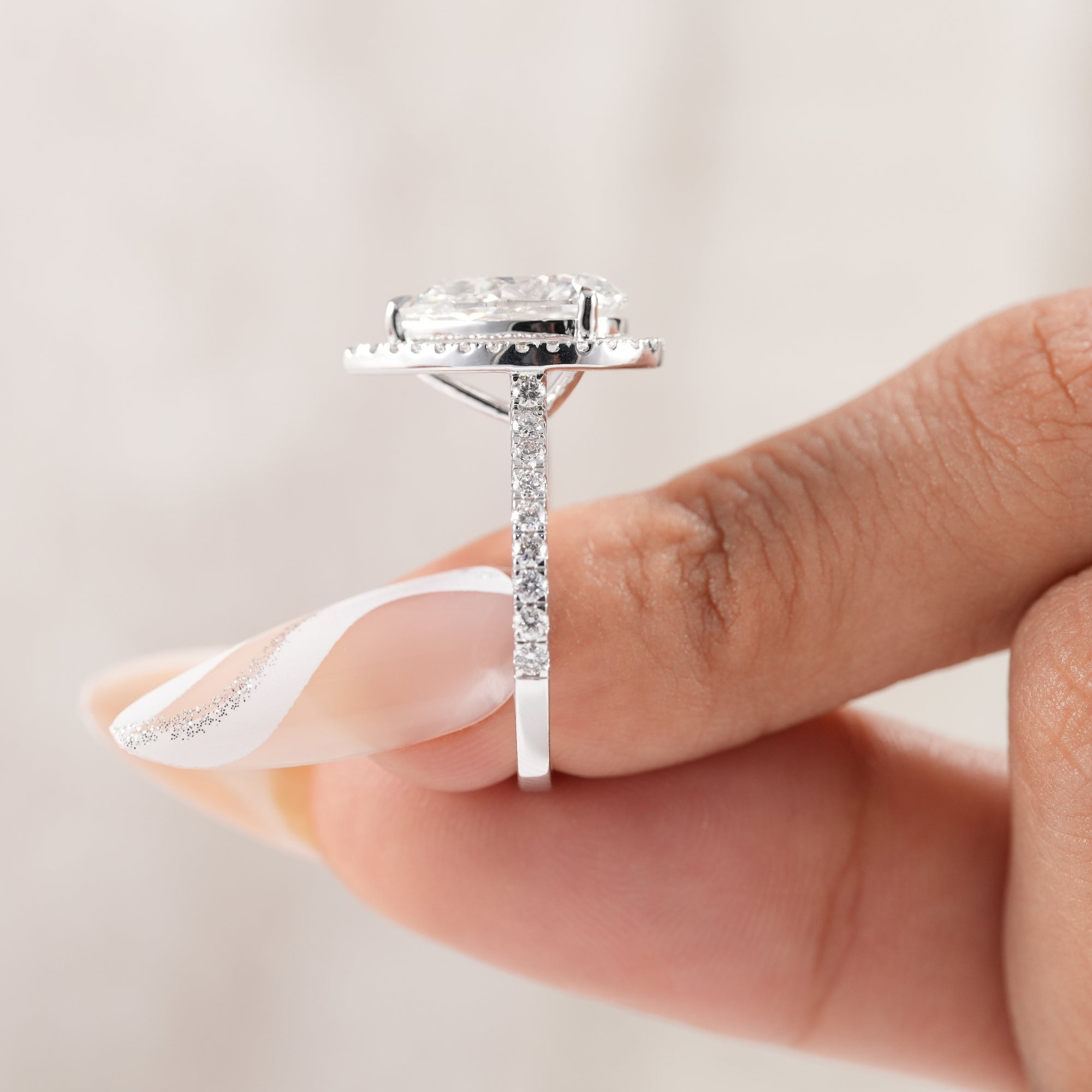 Anniversary gift pear halo diamond ring.