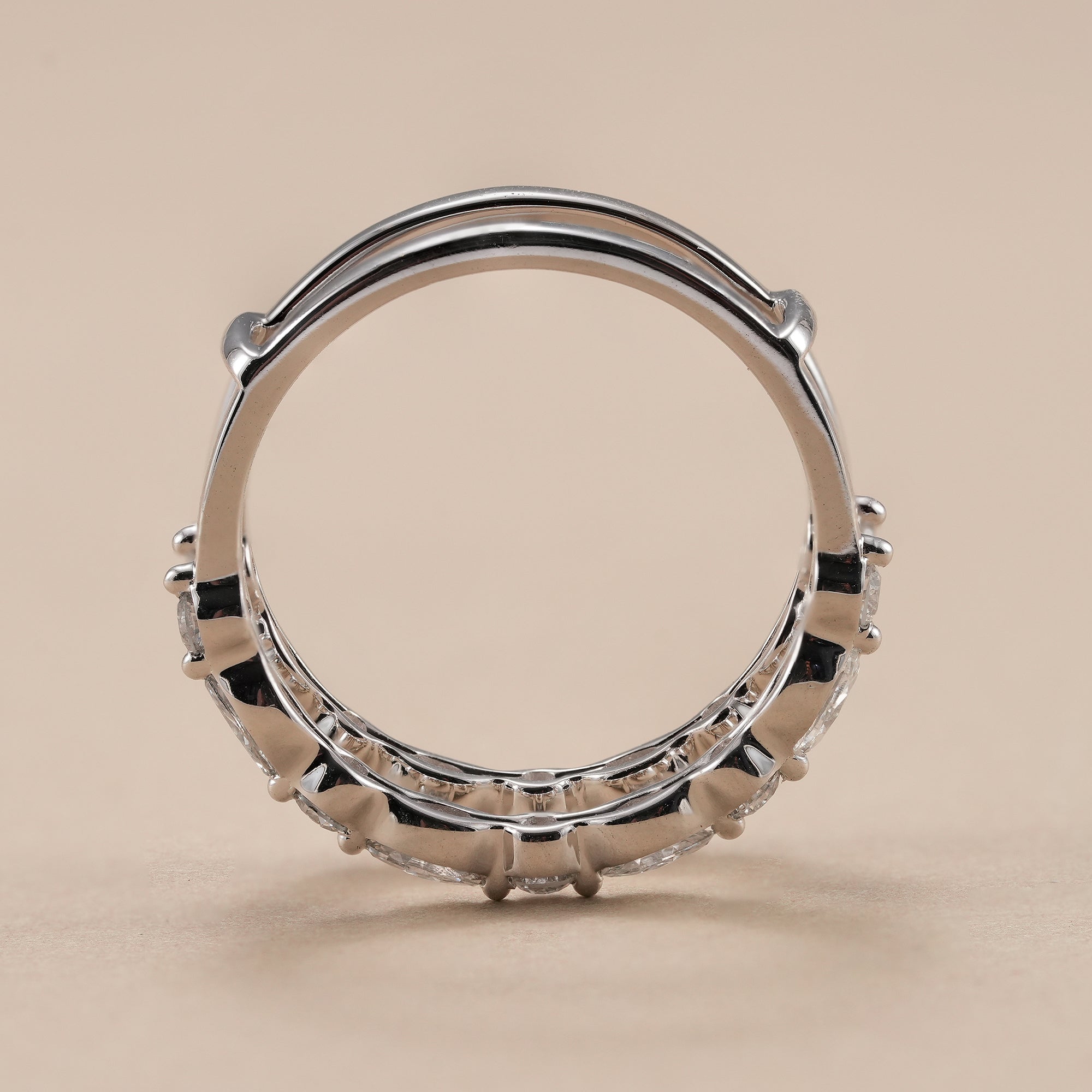Half eternity marquise diamond band handcrafted in white gold.