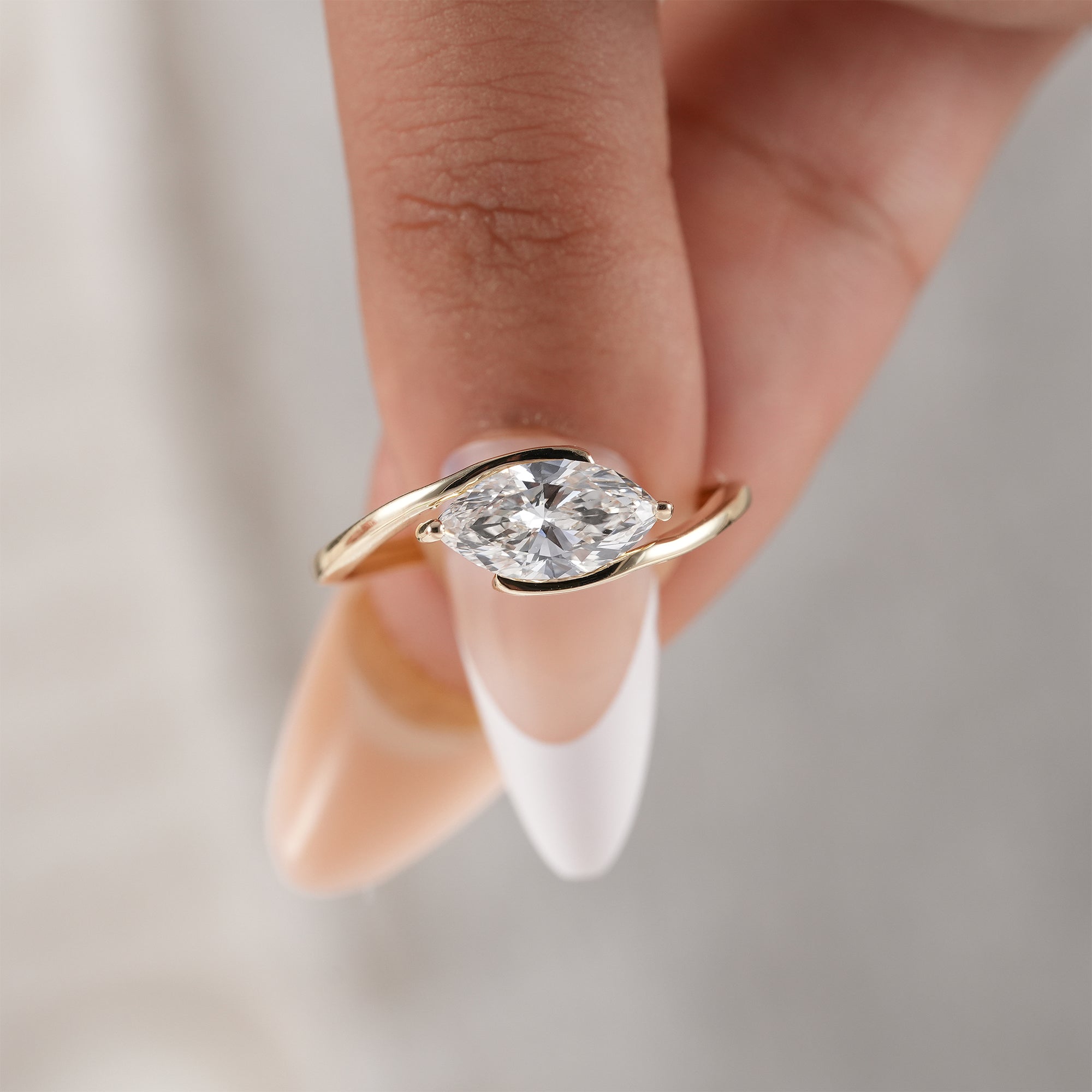 Luxury marquise diamond bypass ring for brides.