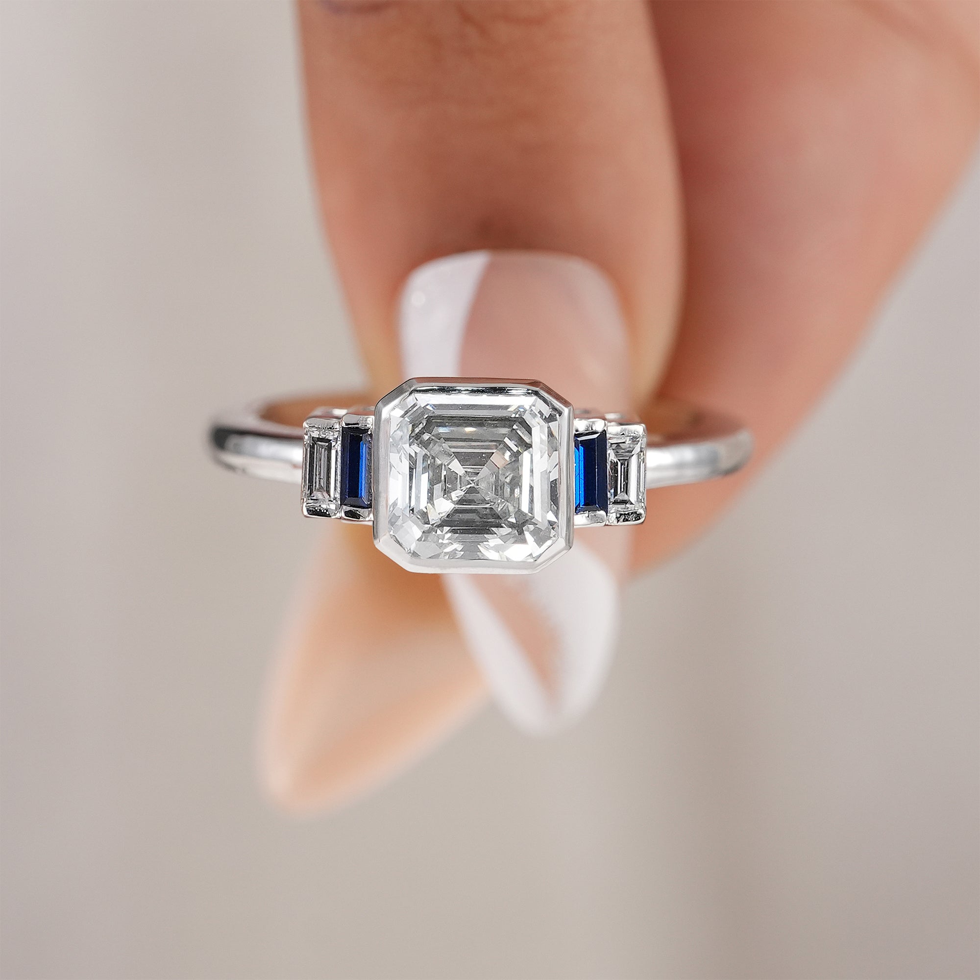 Elegant square emerald lab diamond ring handcrafted in white gold.