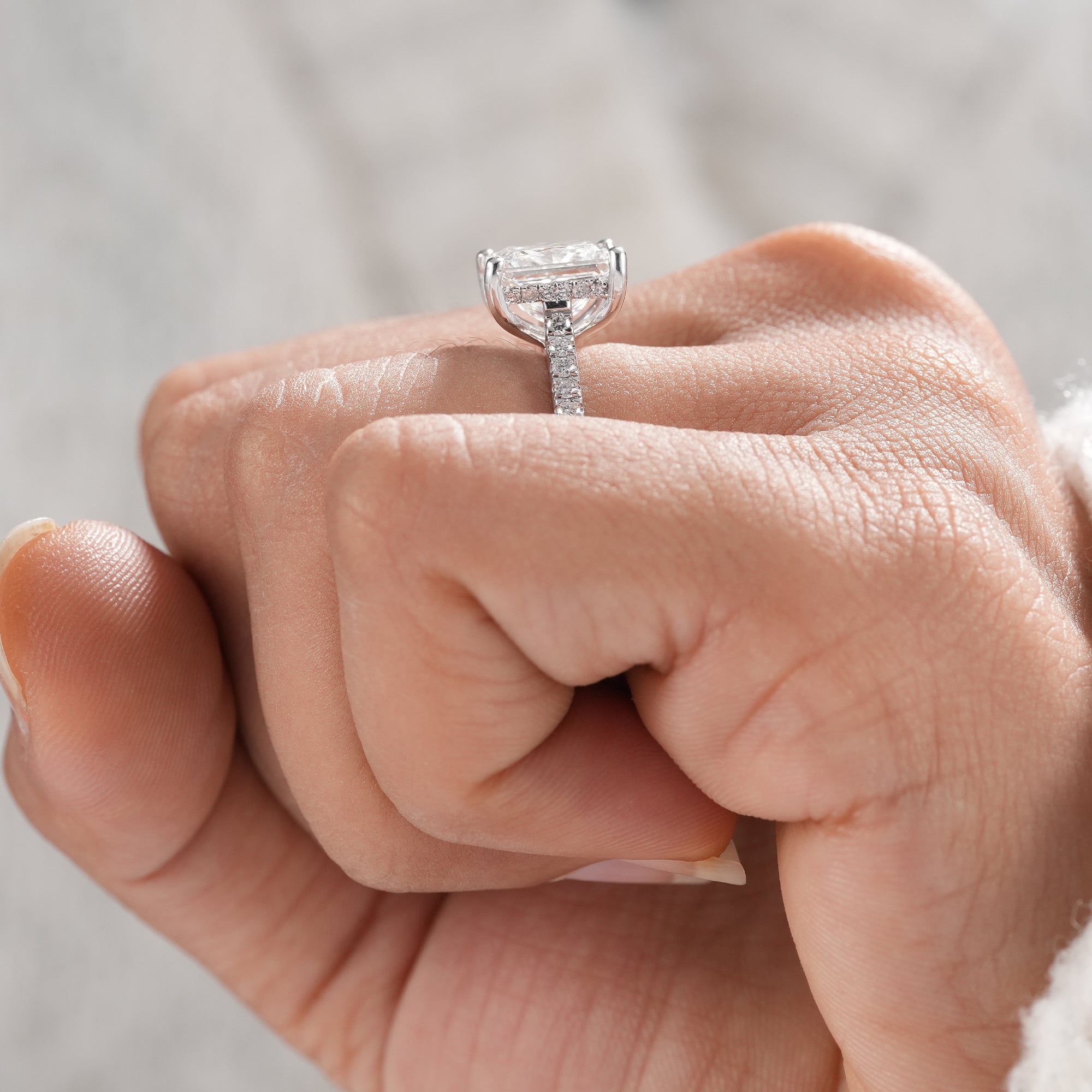 Fine jewelry princess cut diamond engagement ring.