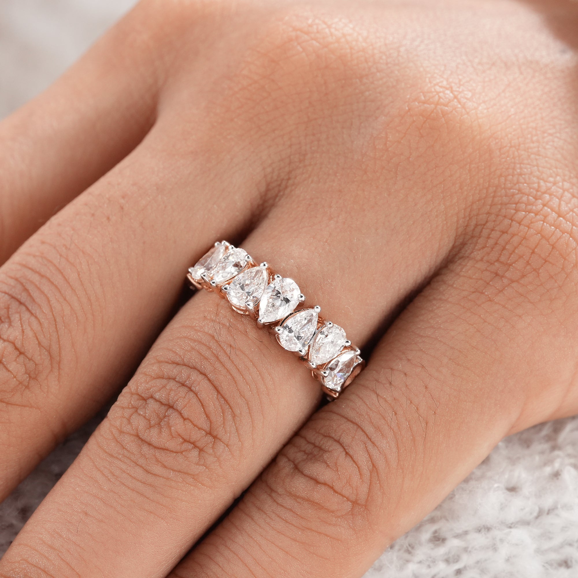 Ethical lab grown pear diamond eternity ring.