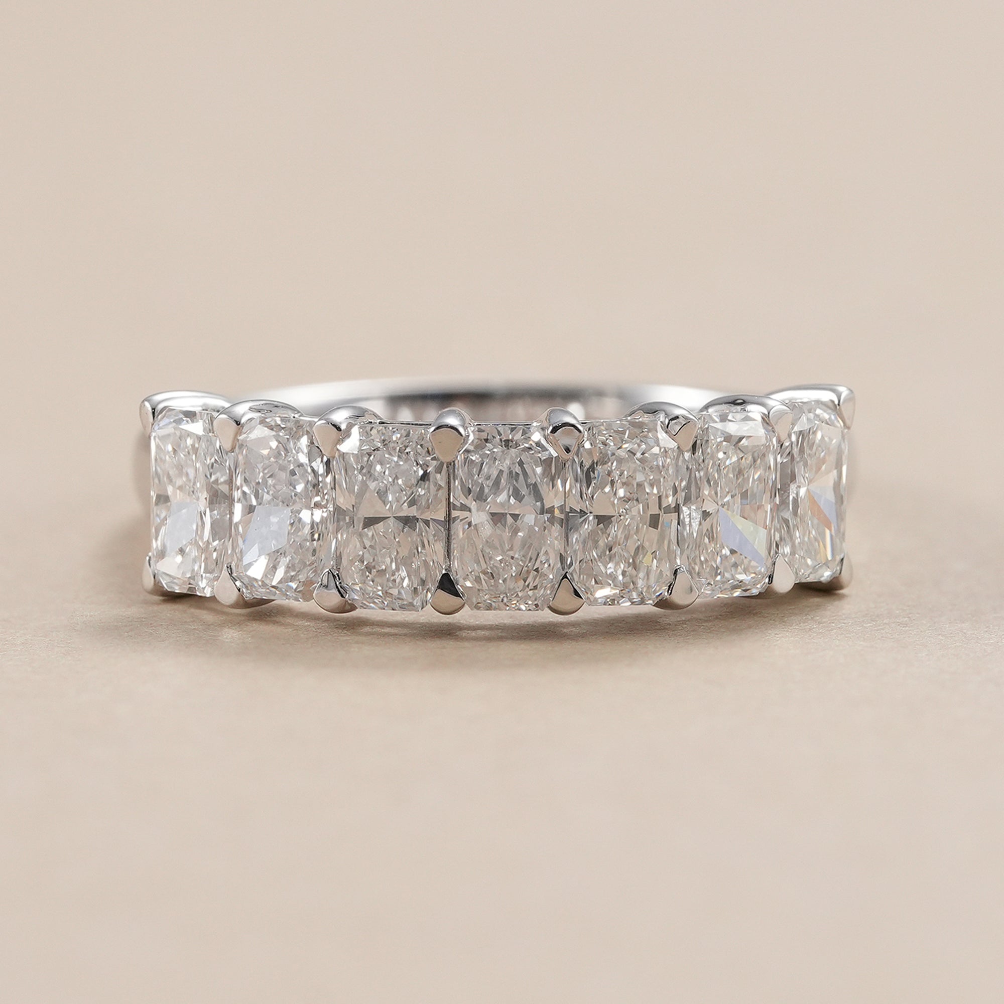 Radiant diamond wedding band with seven lab grown diamonds in white gold.