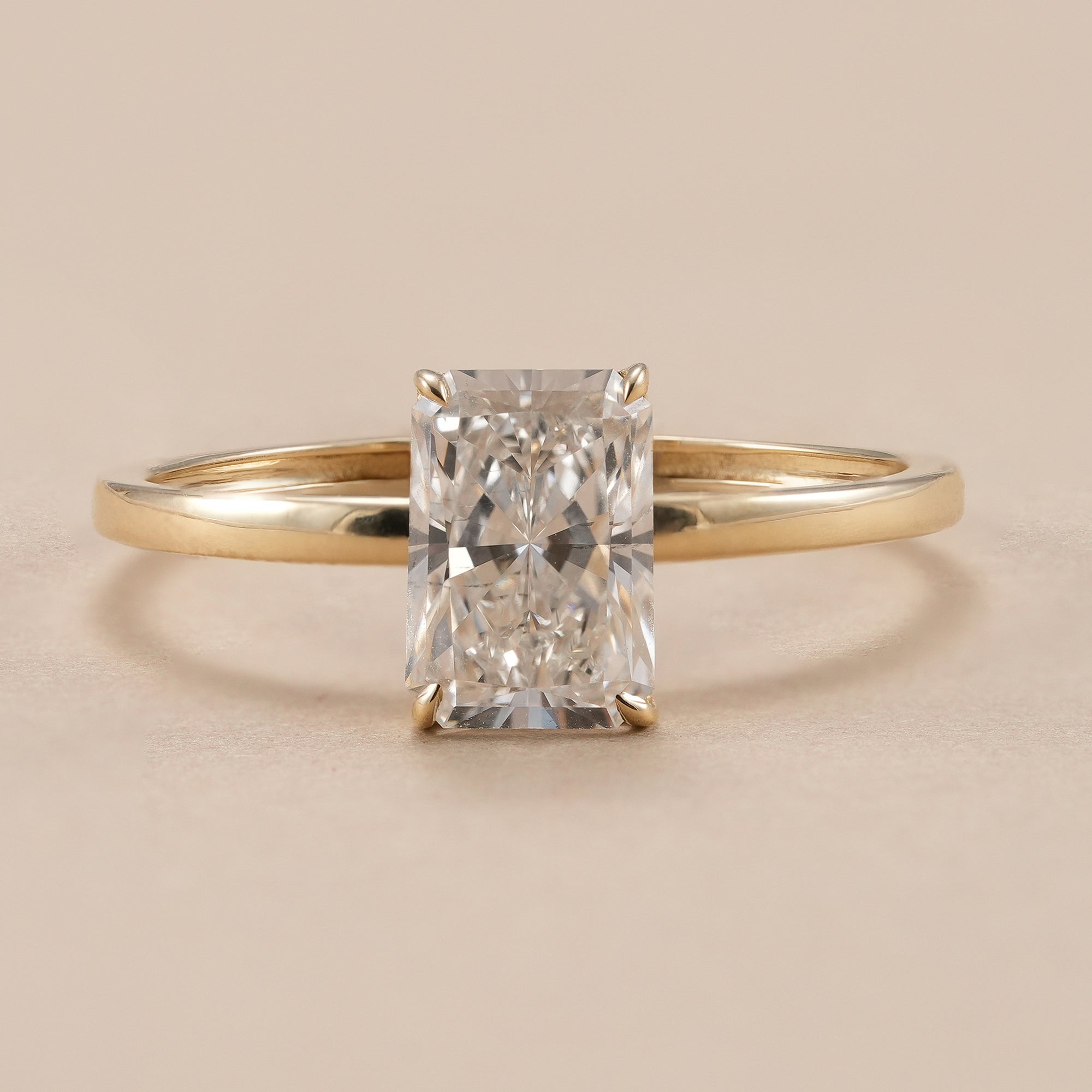 1.8 CT radiant lab grown diamond solitaire engagement ring in yellow gold.