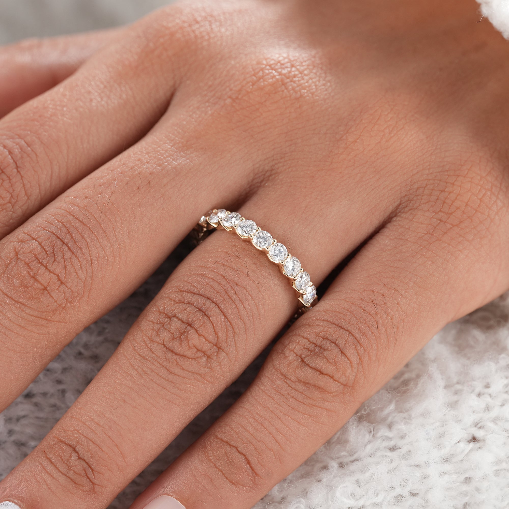 Handmade fine jewelry round diamond eternity band.