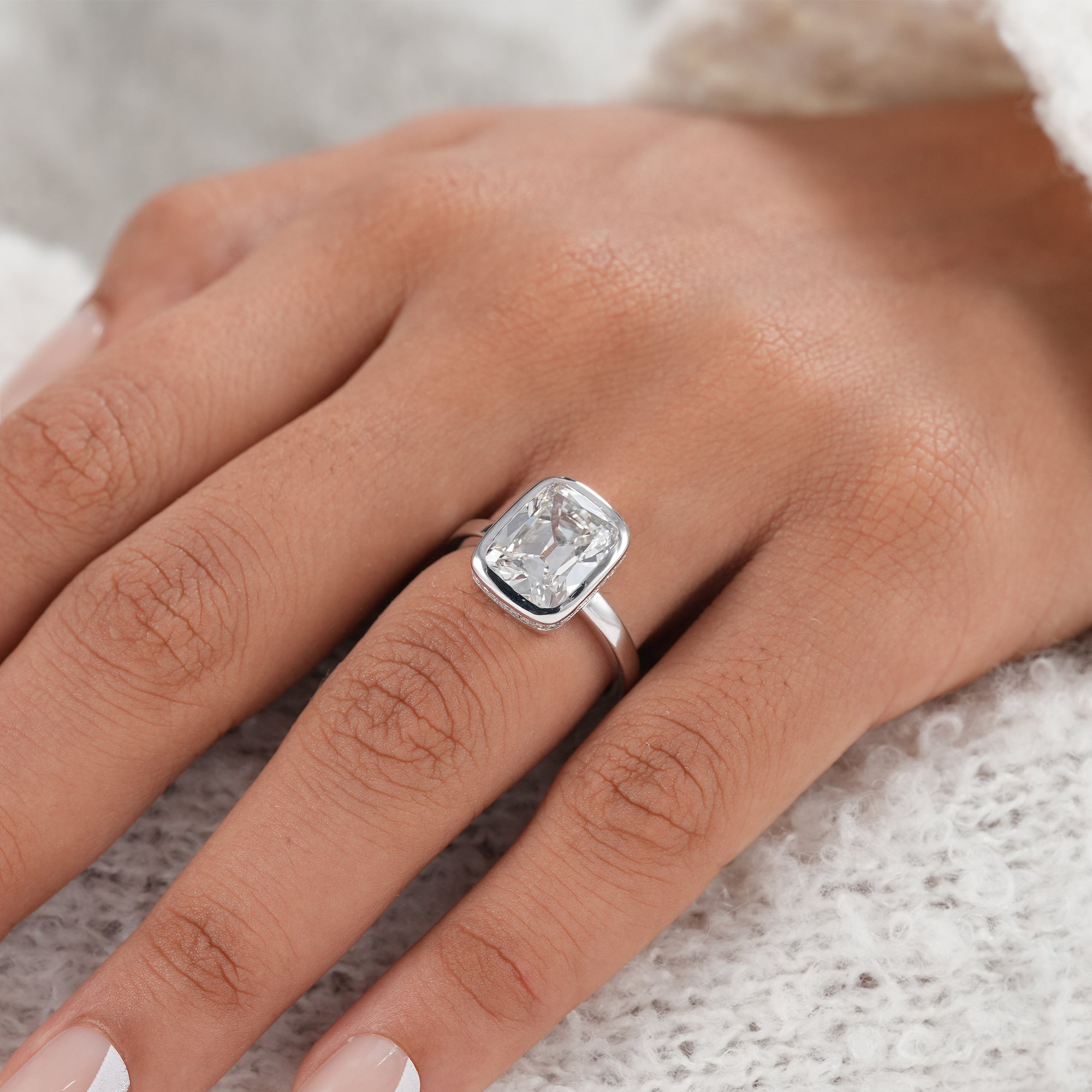 Sustainable cushion cut diamond ring handcrafted in gold.