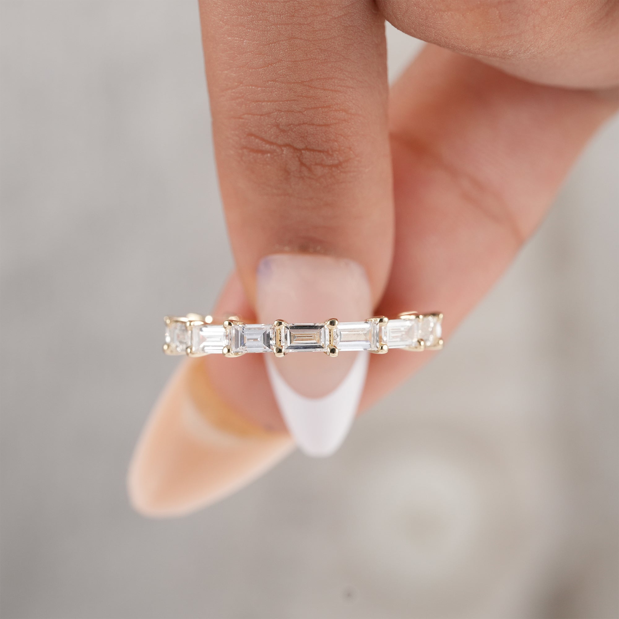 Elegant baguette cut lab diamond eternity ring.