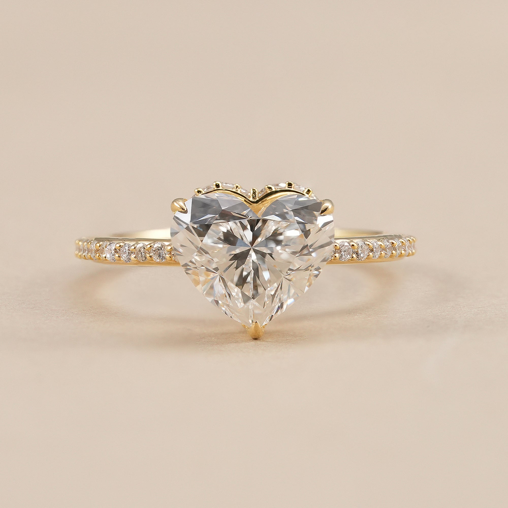Heart lab grown diamond engagement ring with hidden halo and pavé band