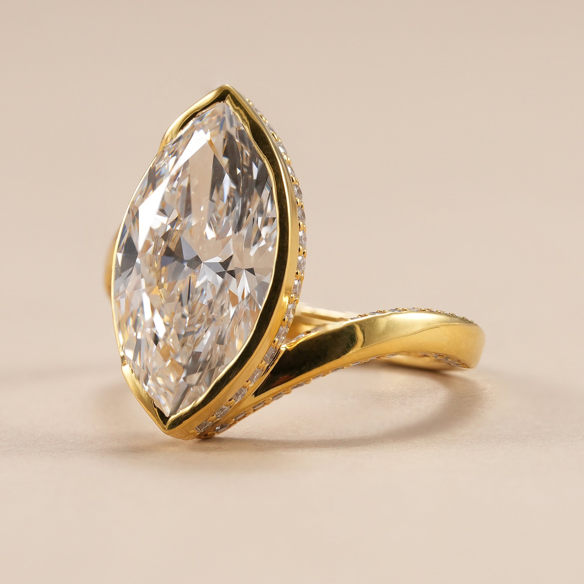 IGI certified marquise diamond ring in polished yellow gold.