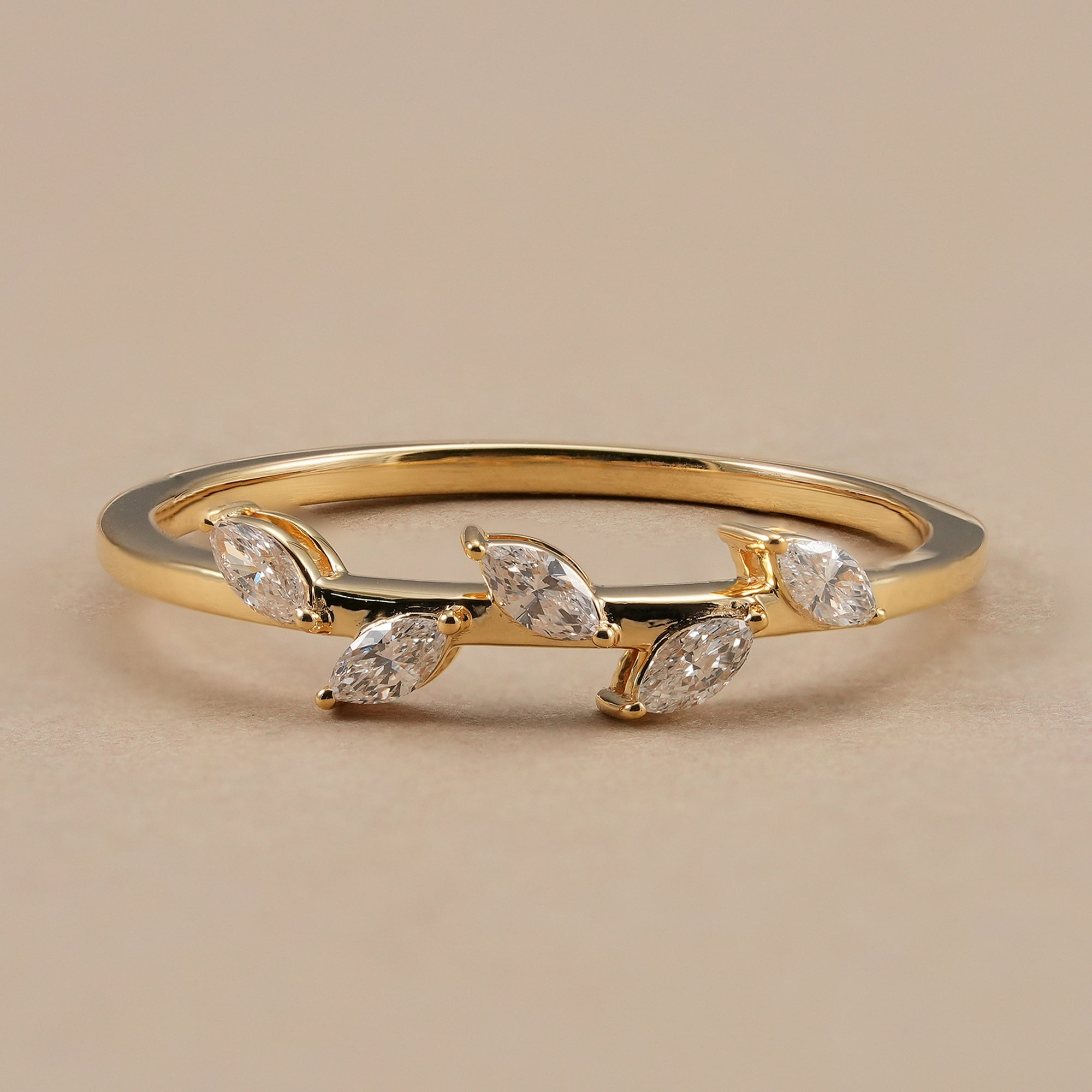 Marquise lab grown diamond wedding band featuring a delicate leaf design