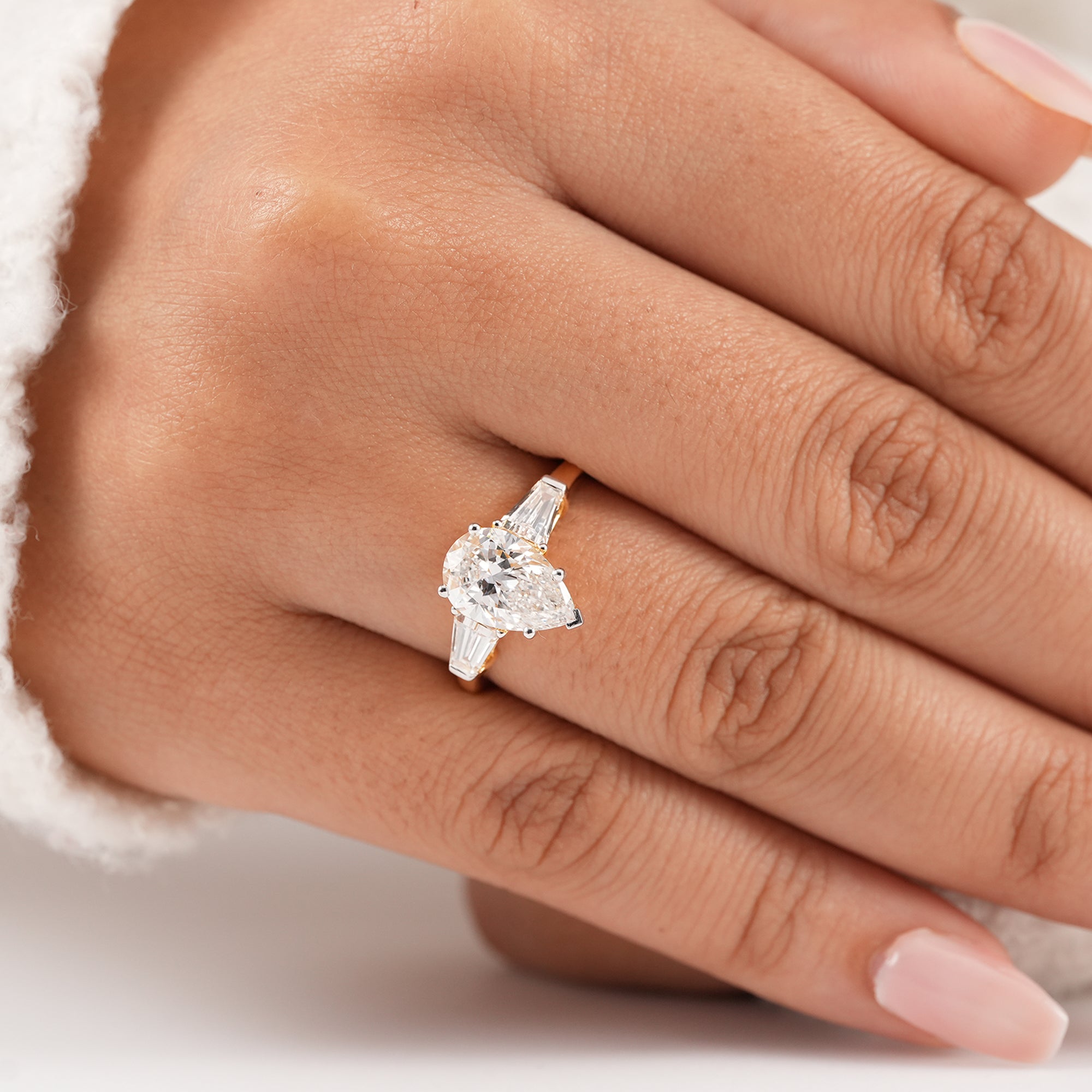 Pear cut lab diamond bridal ring with baguette accent diamonds