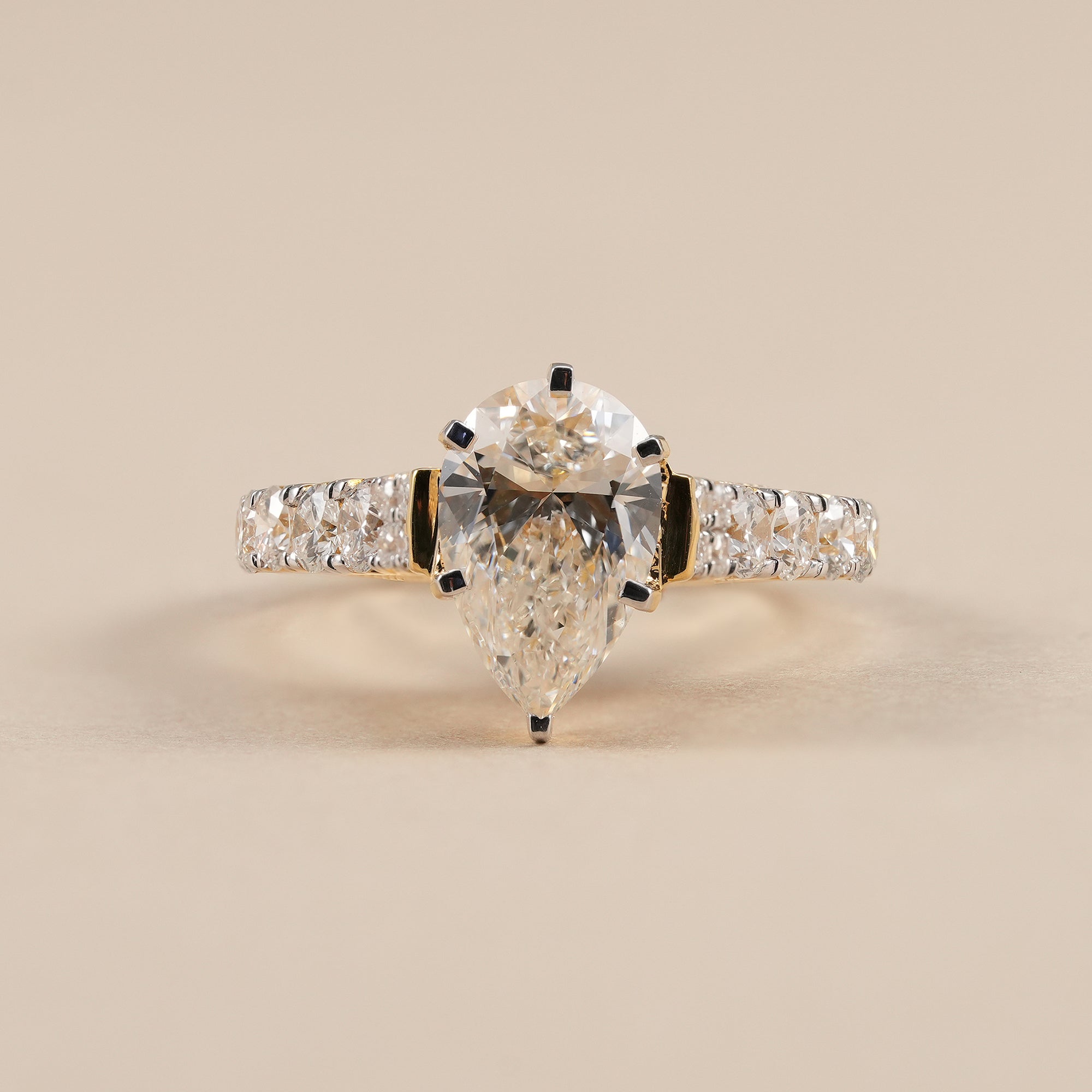 Pear lab grown diamond engagement ring with vintage engraved pavé band