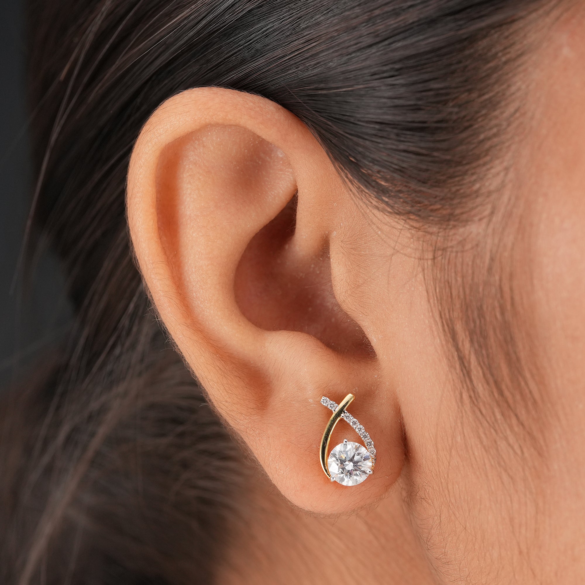 Round lab grown diamond infinity stud earrings in polished yellow gold