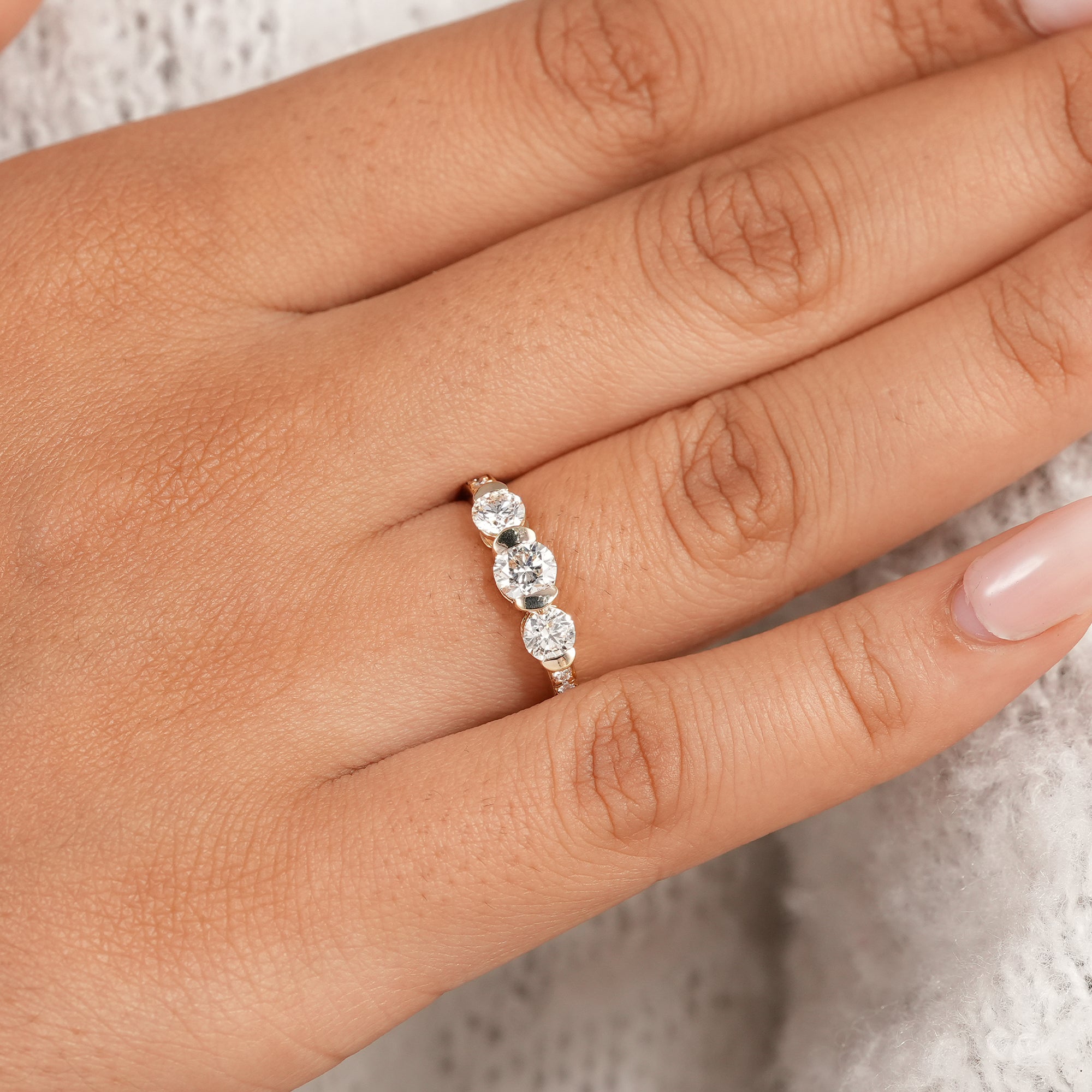 Anniversary trilogy diamond ring with three brilliant round diamonds