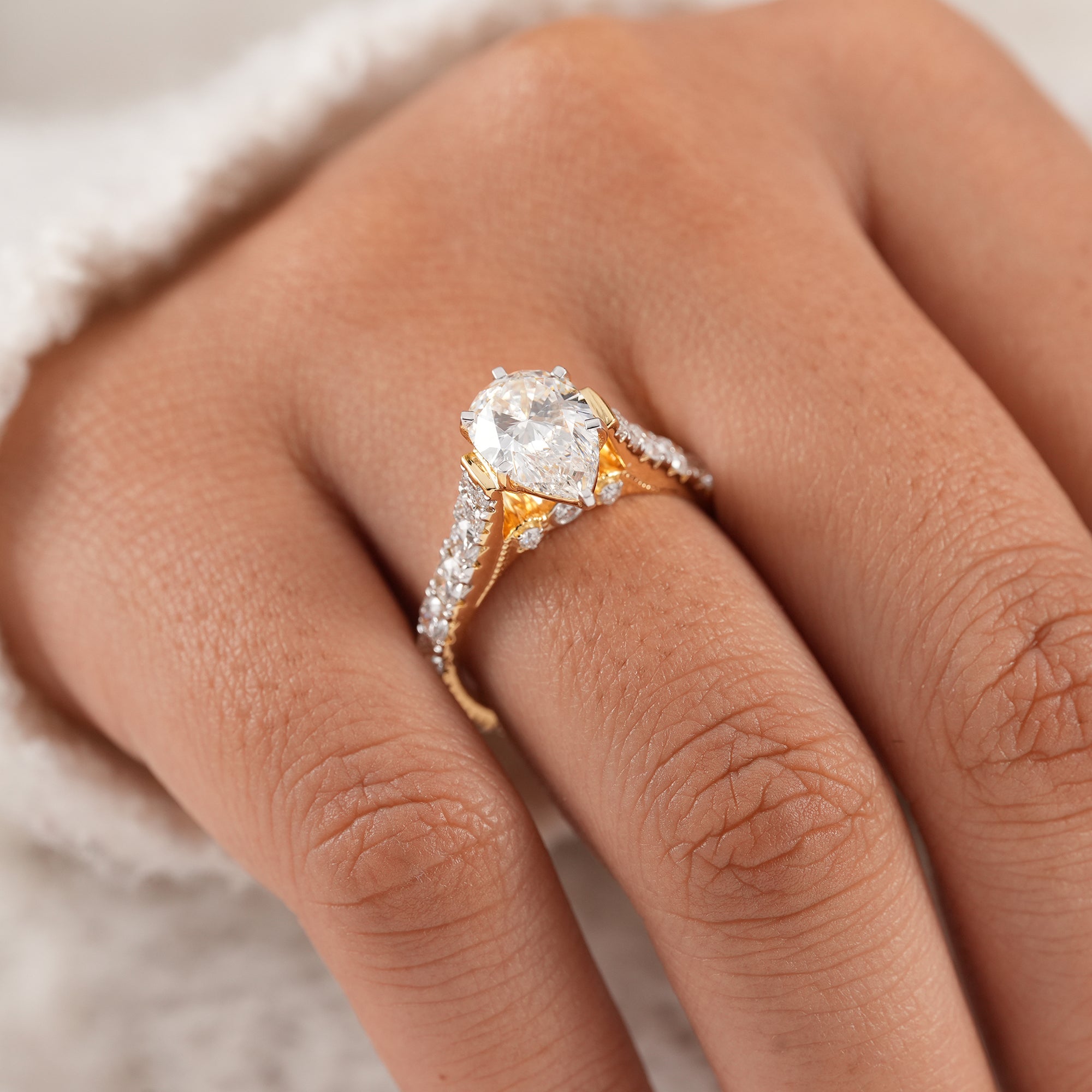 Handcrafted pear lab grown diamond ring with pavé accents