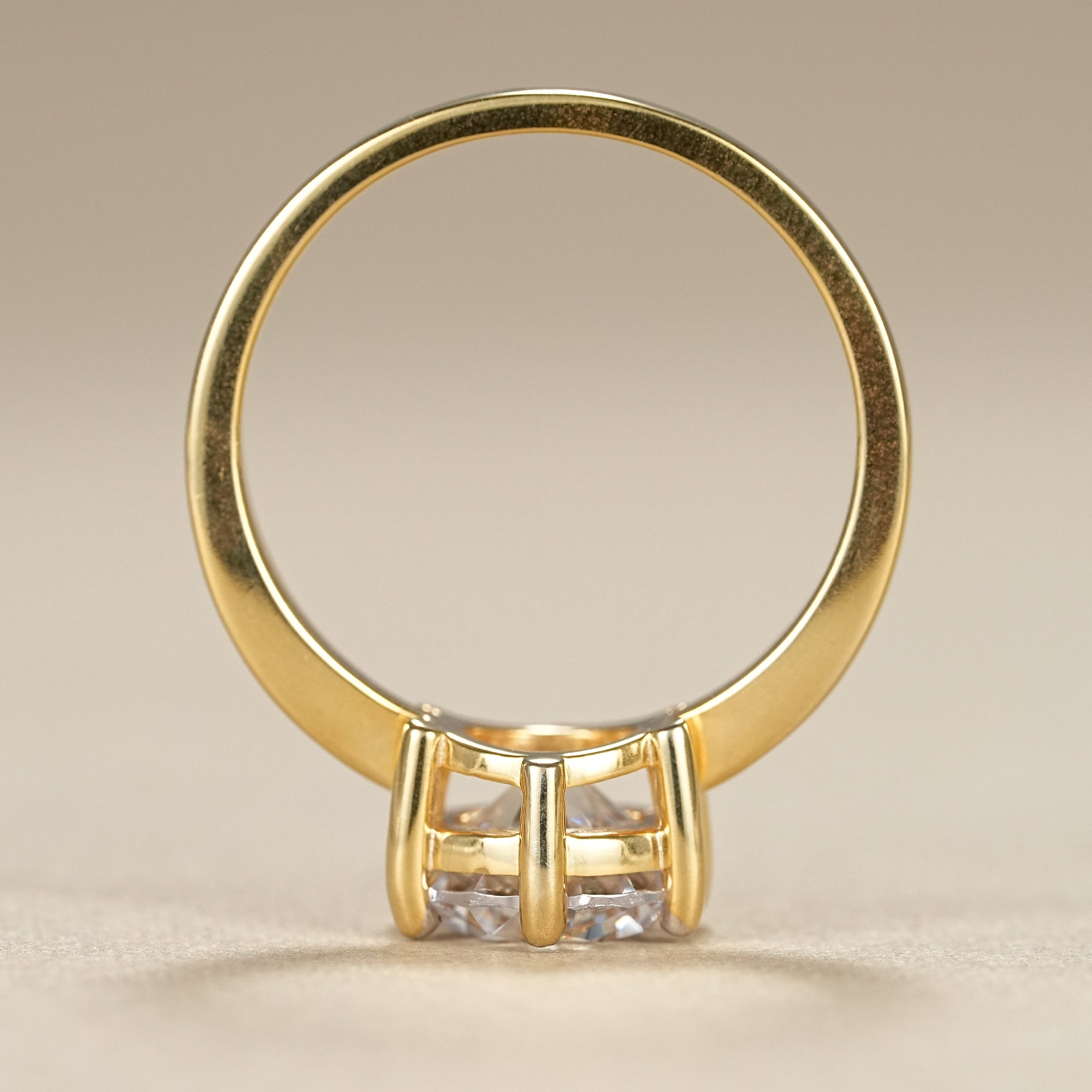 Dainty yellow gold engagement ring with round cut solitaire lab diamond
