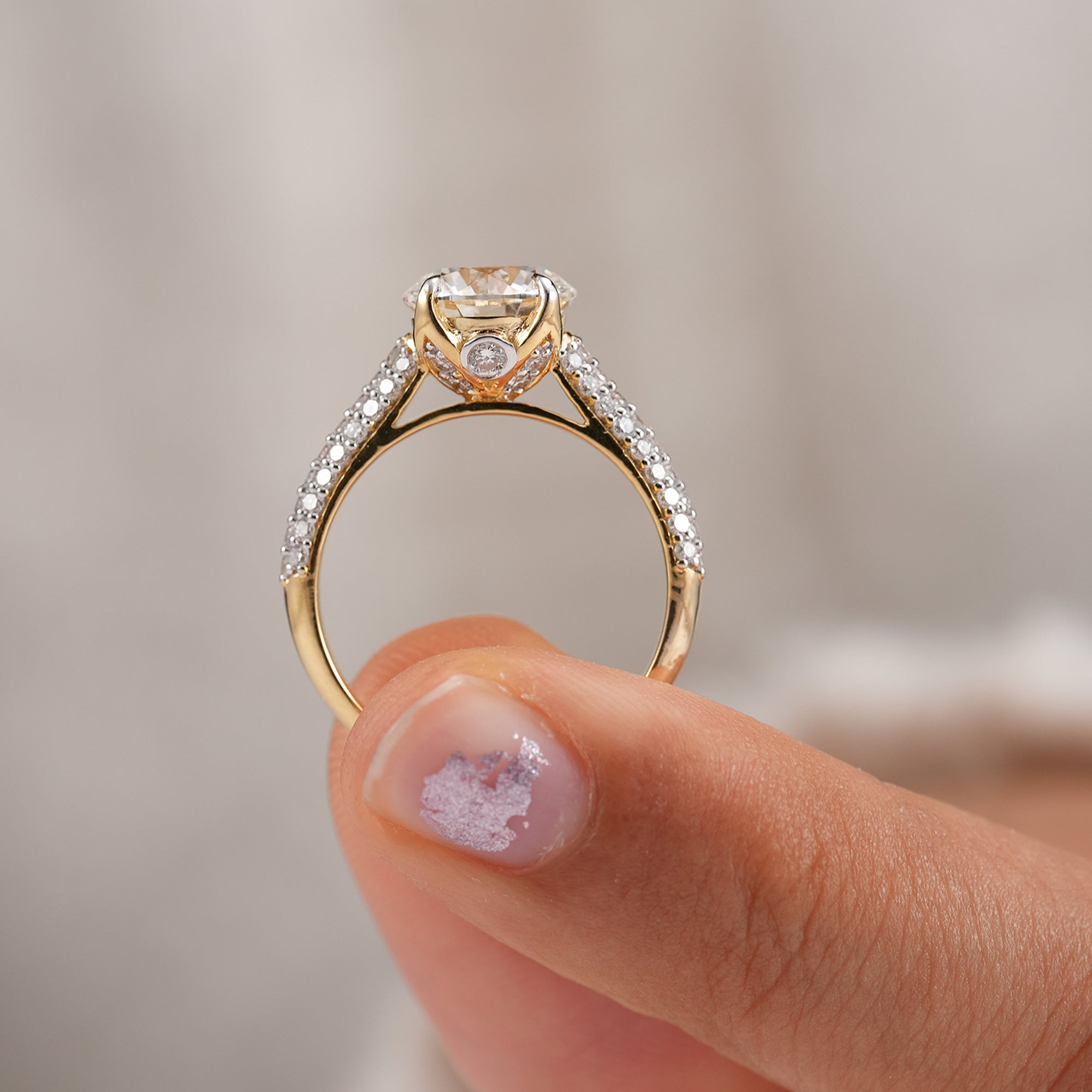 Fine jewelry round solitaire ring featuring ethical lab grown diamonds