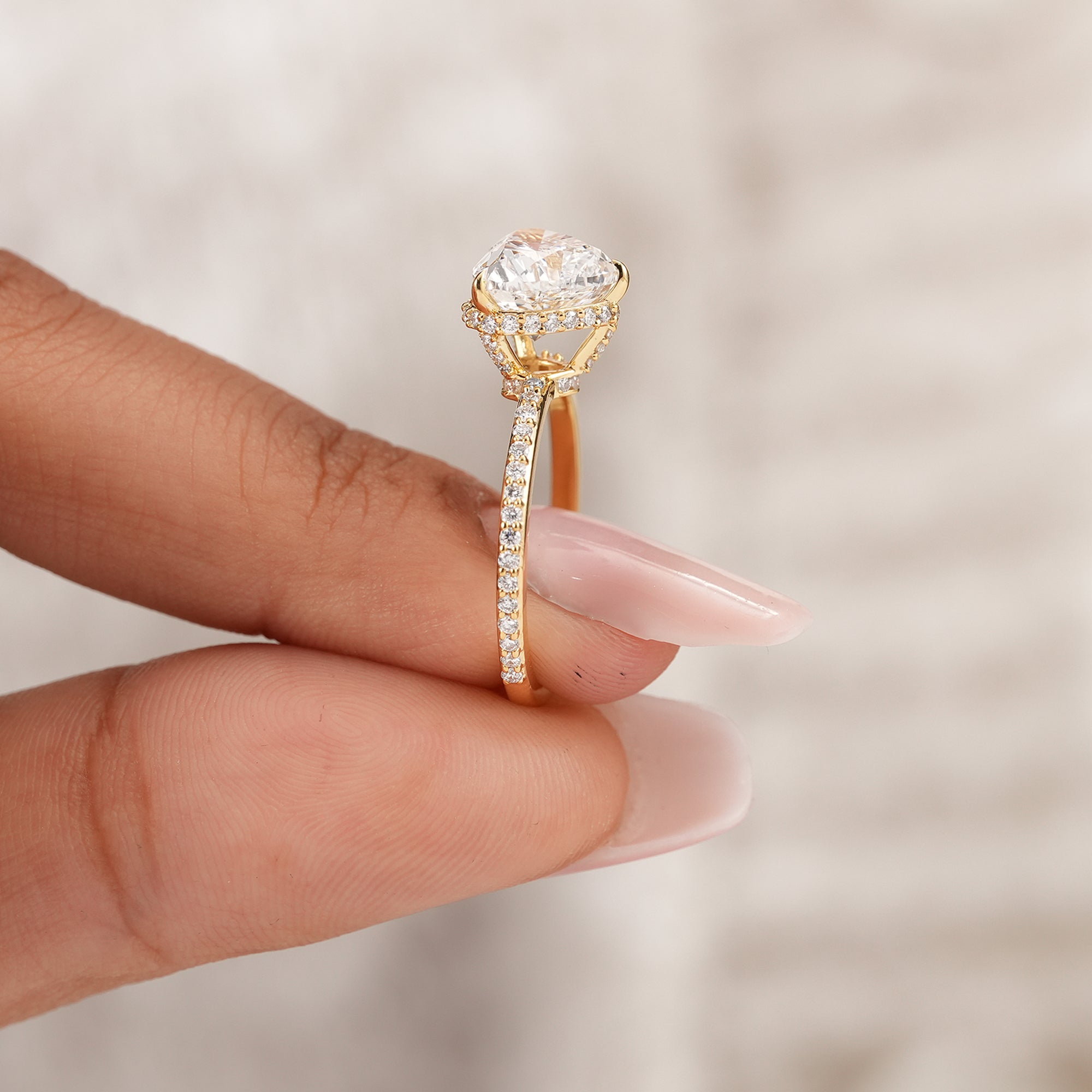 Women's heart diamond proposal ring with hidden halo detail