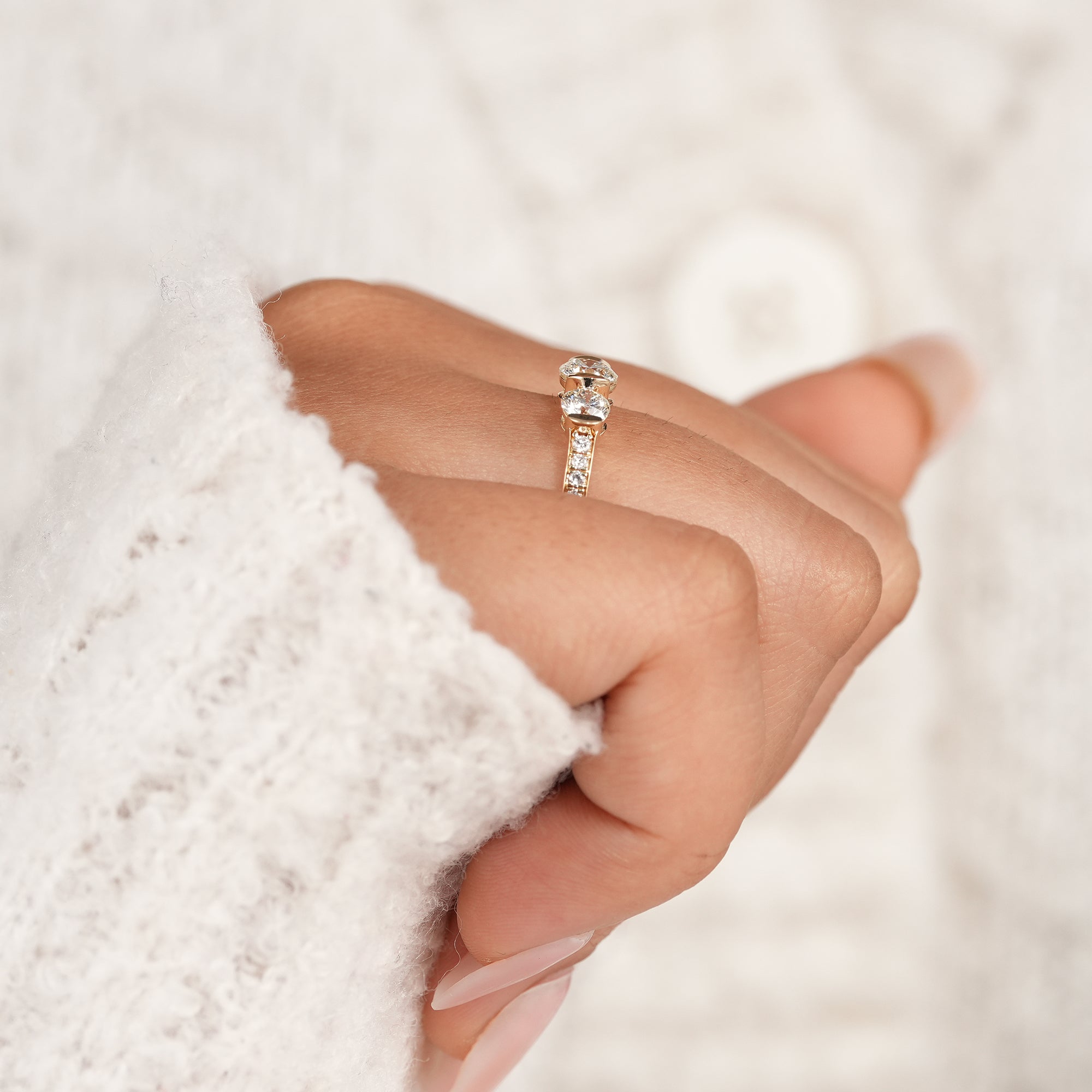 Handcrafted three stone lab grown diamond ring with pavé setting