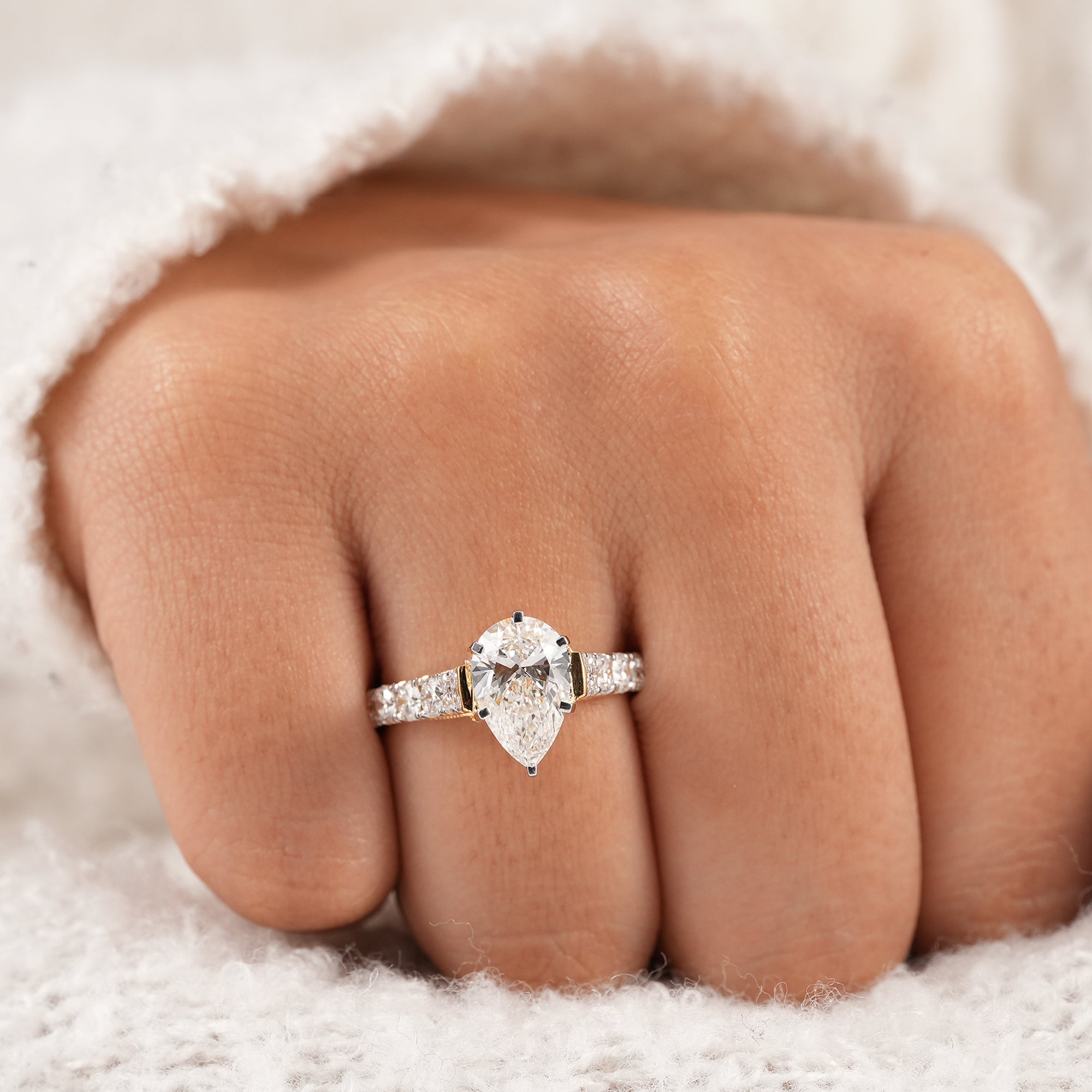 Timeless pear engagement ring featuring lab grown diamond