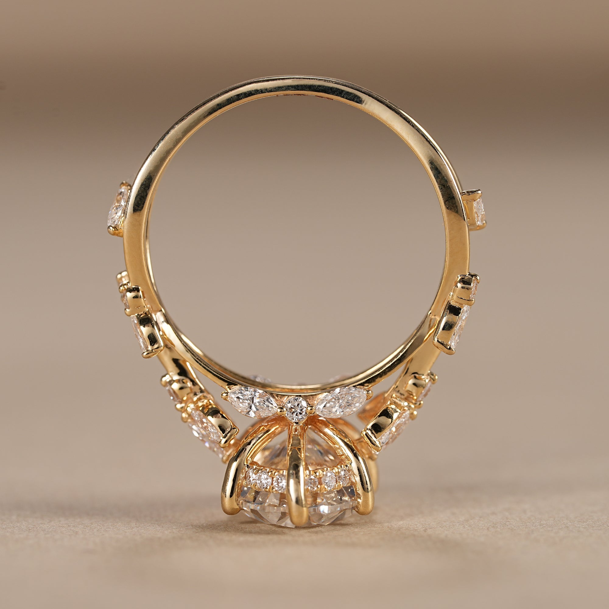 Twisted vine engagement ring with oval solitaire lab diamond and marquise side stones