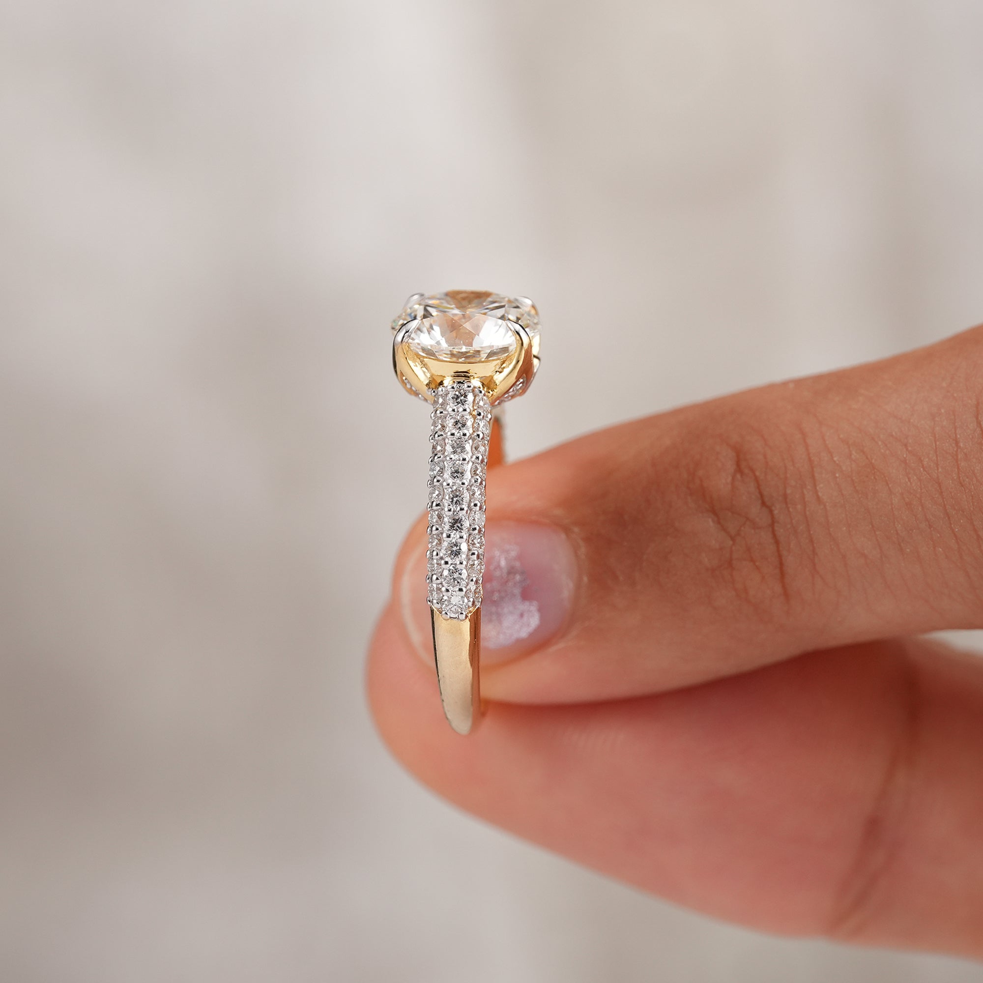 Premium round diamond engagement ring with secure four prong setting