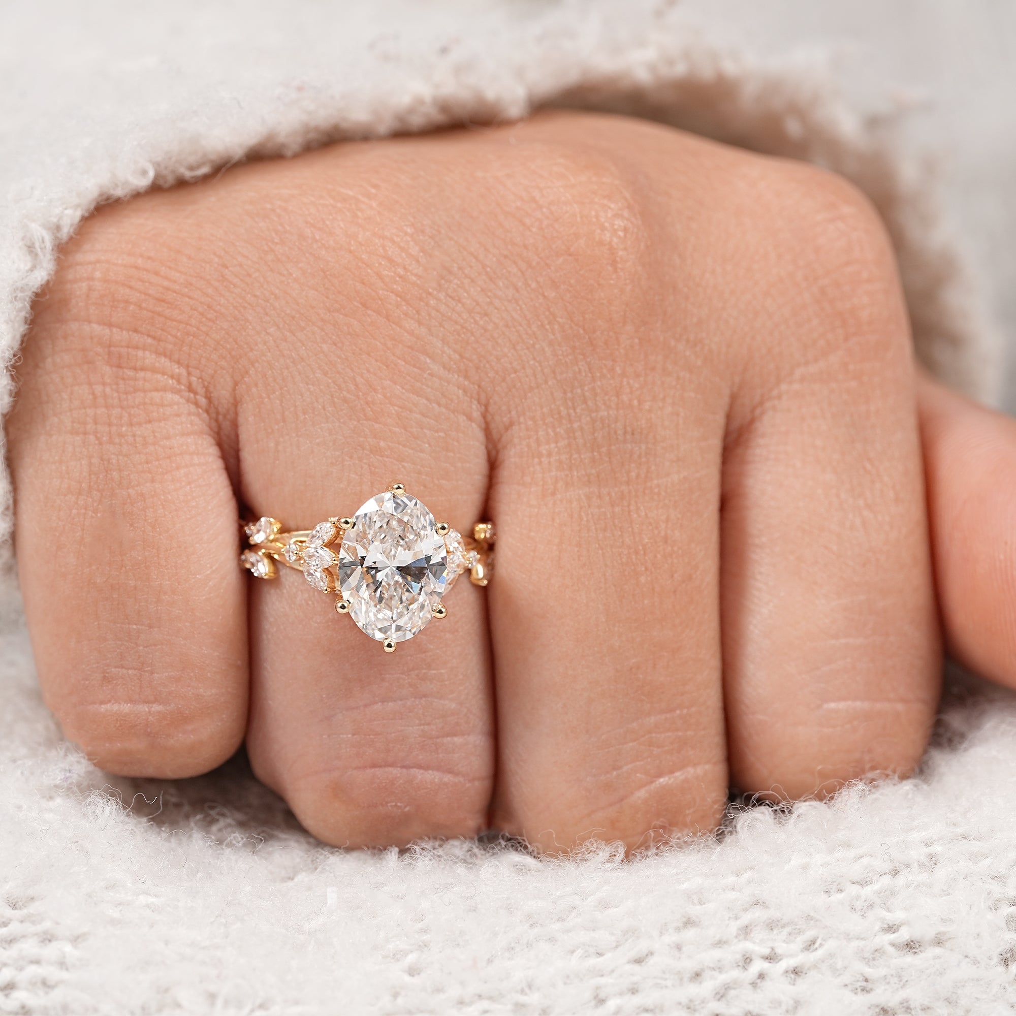 Luxury oval lab diamond solitaire ring with botanical twisted vine inspired setting