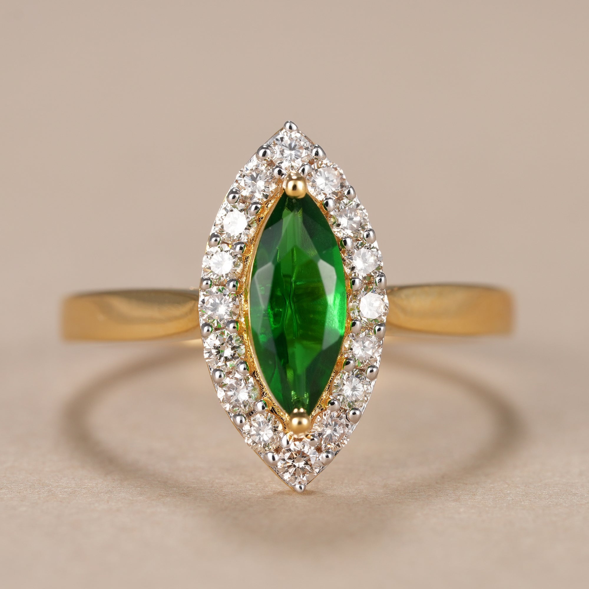 Marquise Cut Emerald Diamond Halo Engagement Ring