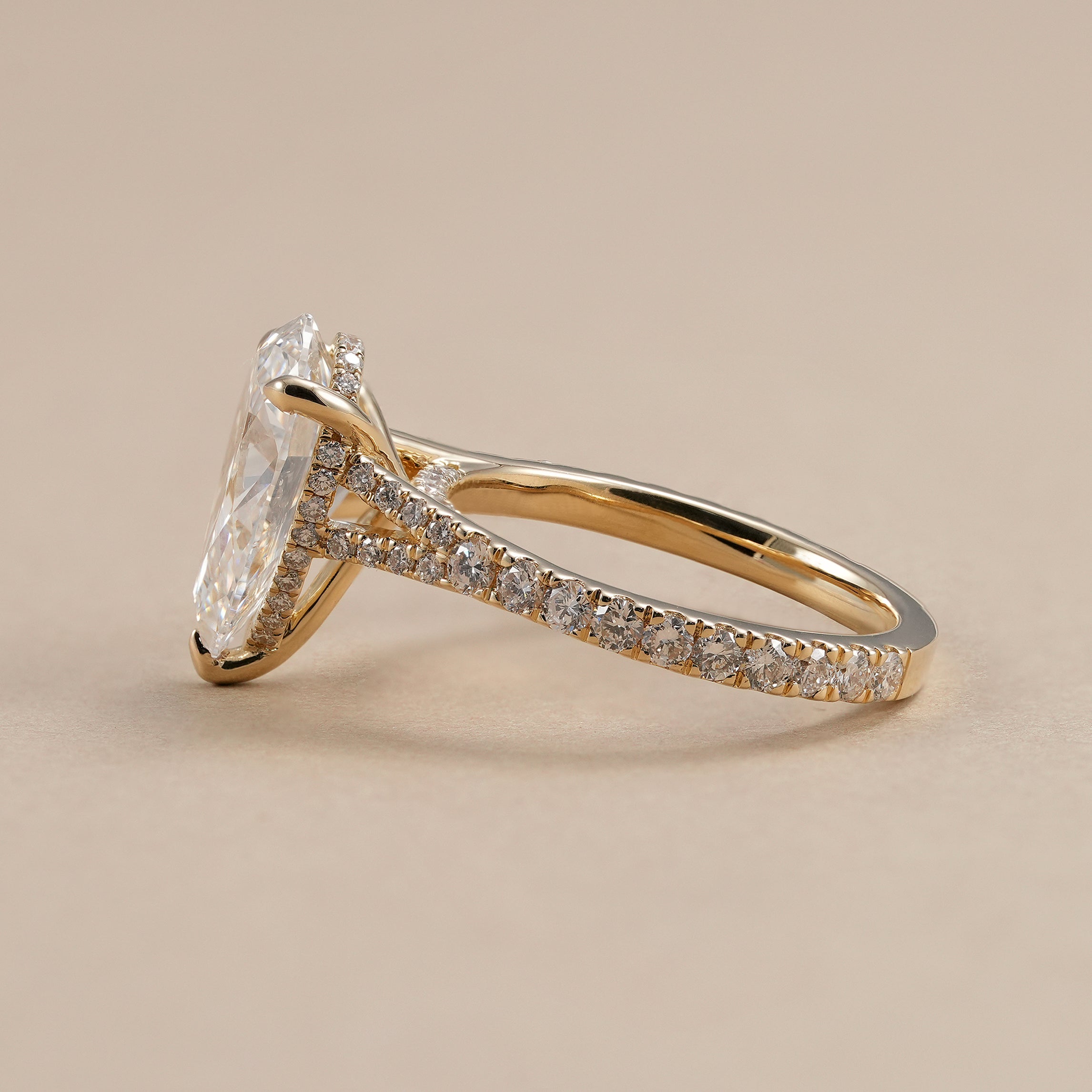 IGI certified pear lab diamond ring with split shank setting