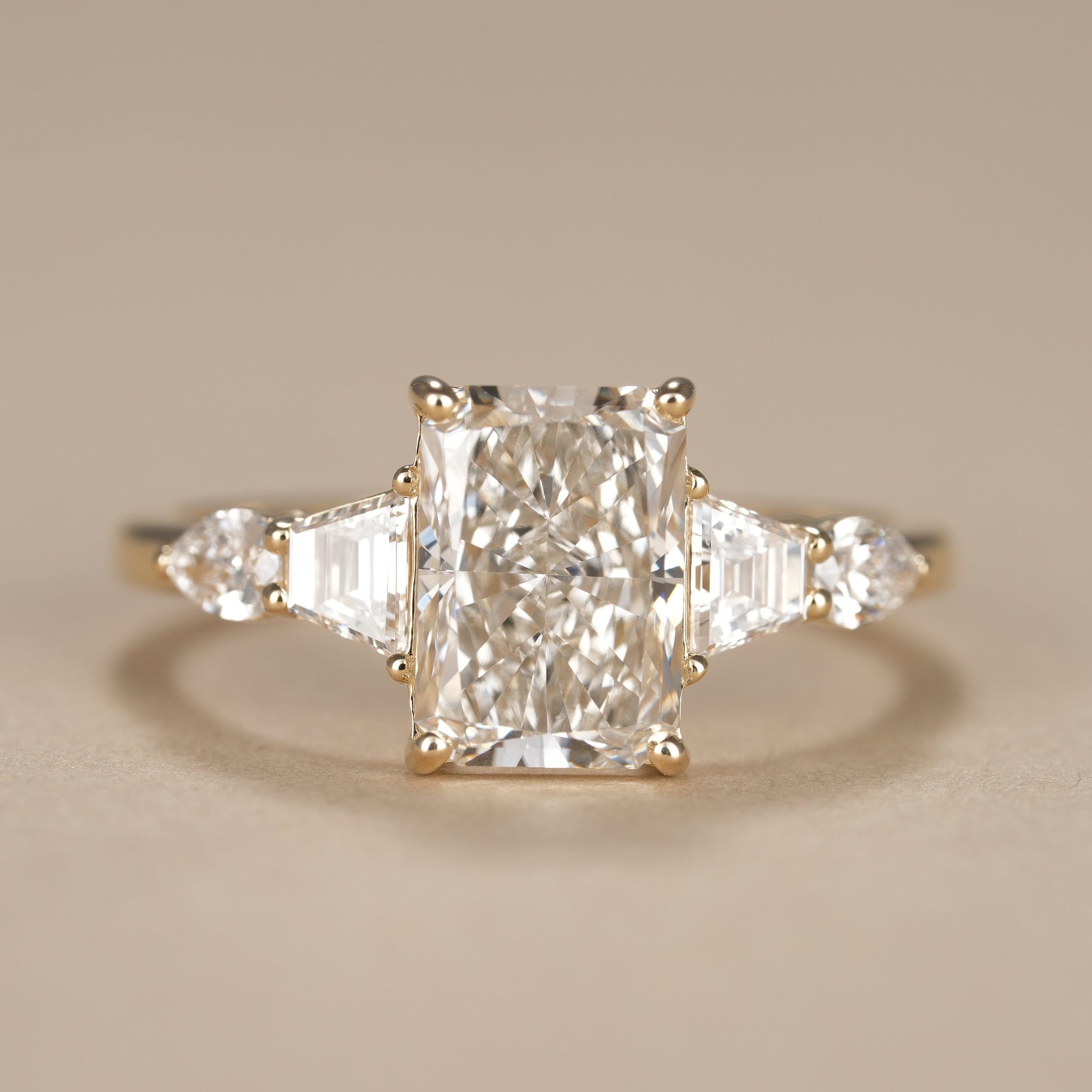Multi Stone Radiant Lab Diamond Engagement Ring With Tapered Baguette Side Stones