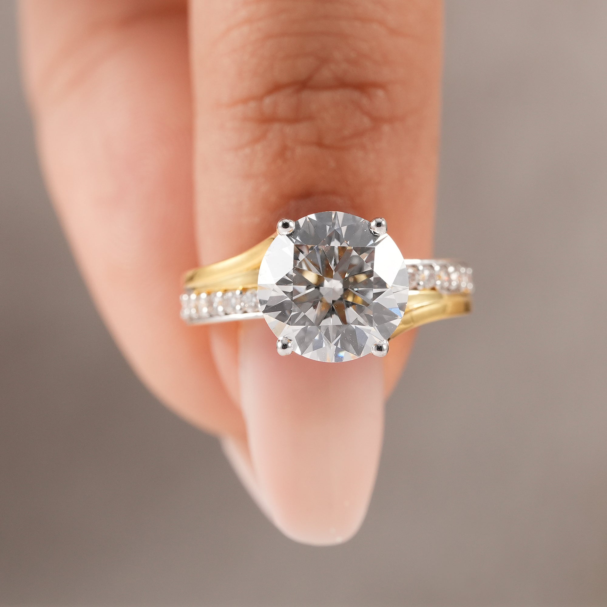 IGI certified round diamond solitaire ring in polished yellow gold