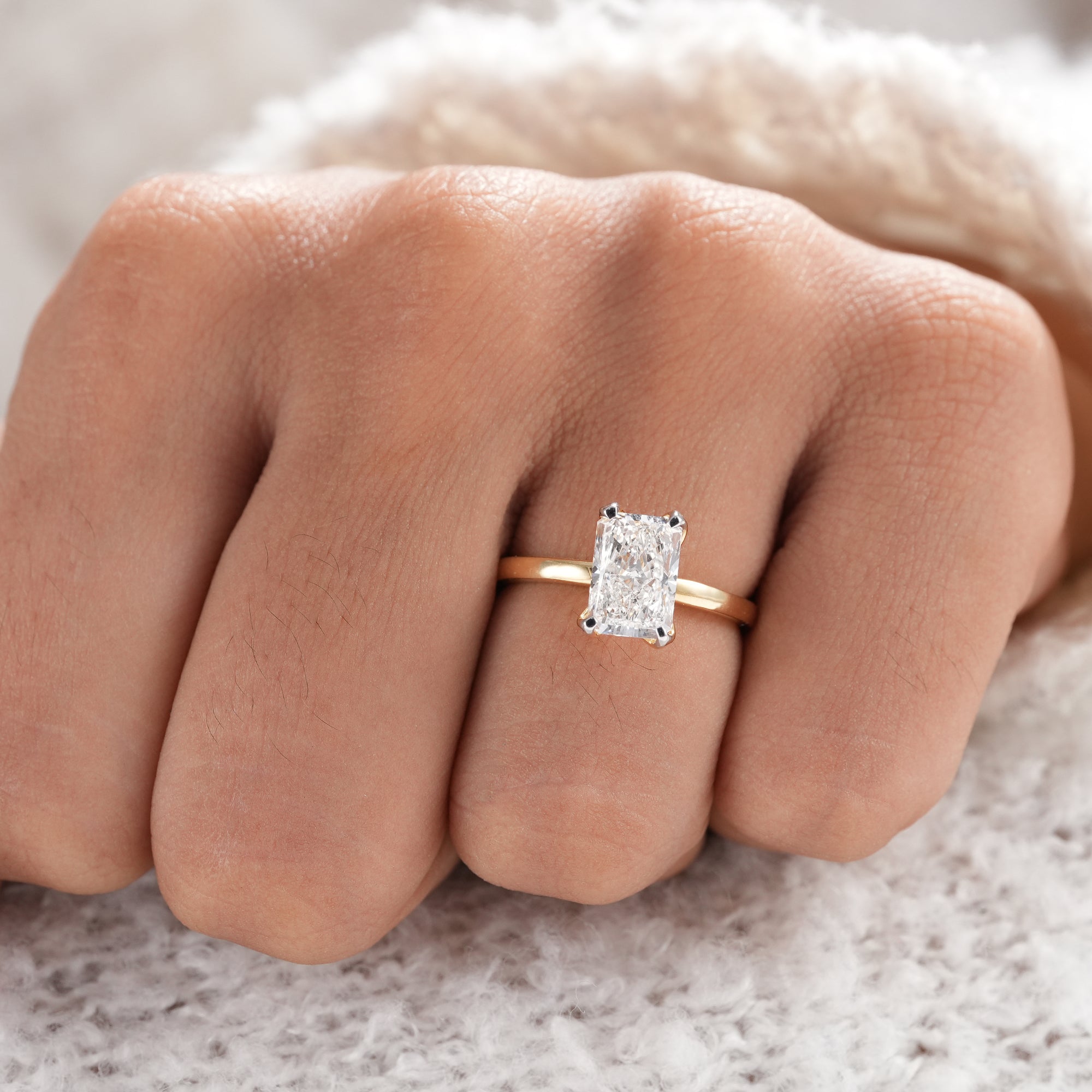 Luxury radiant cut lab grown diamond ring for engagement.