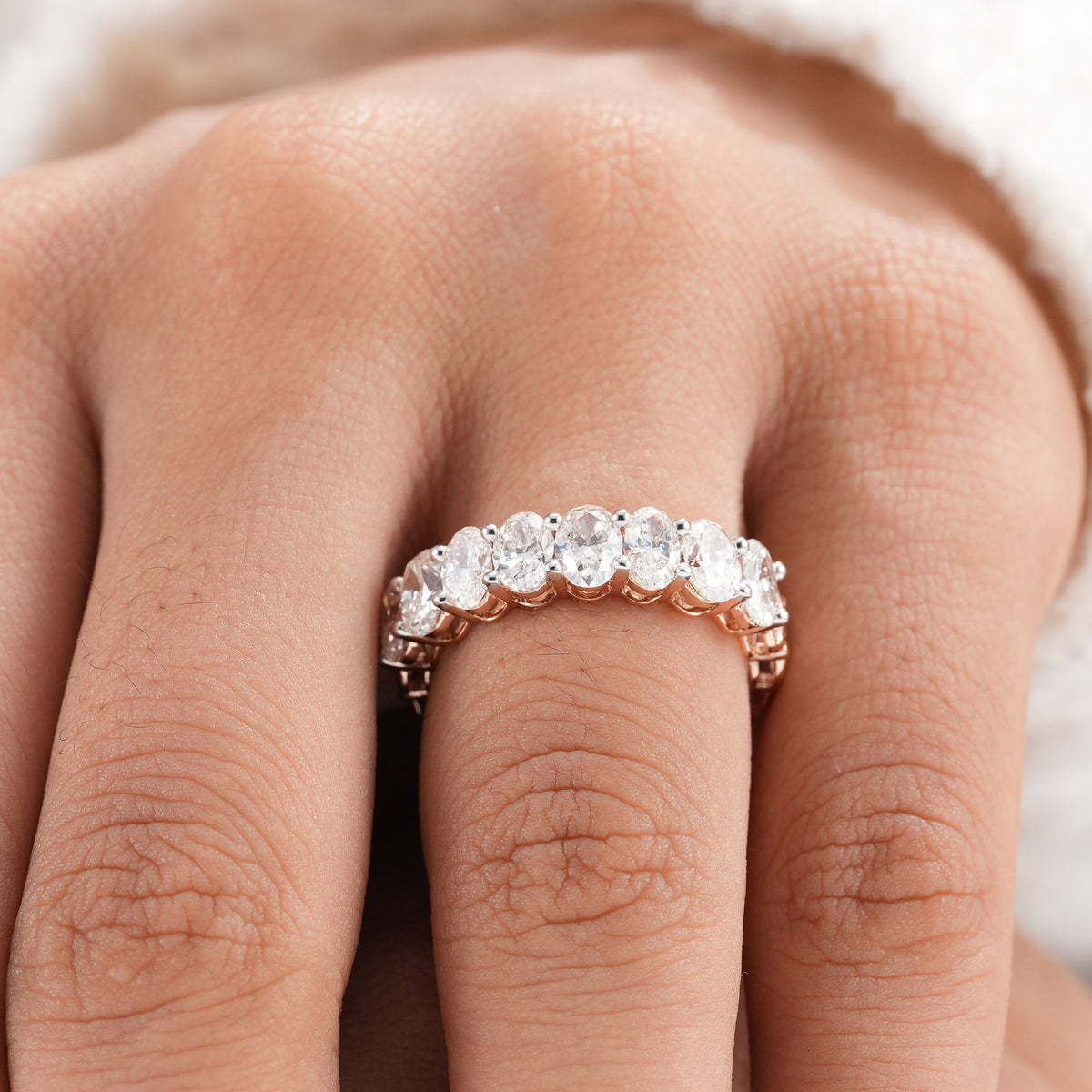Lab grown oval diamond anniversary ring.
