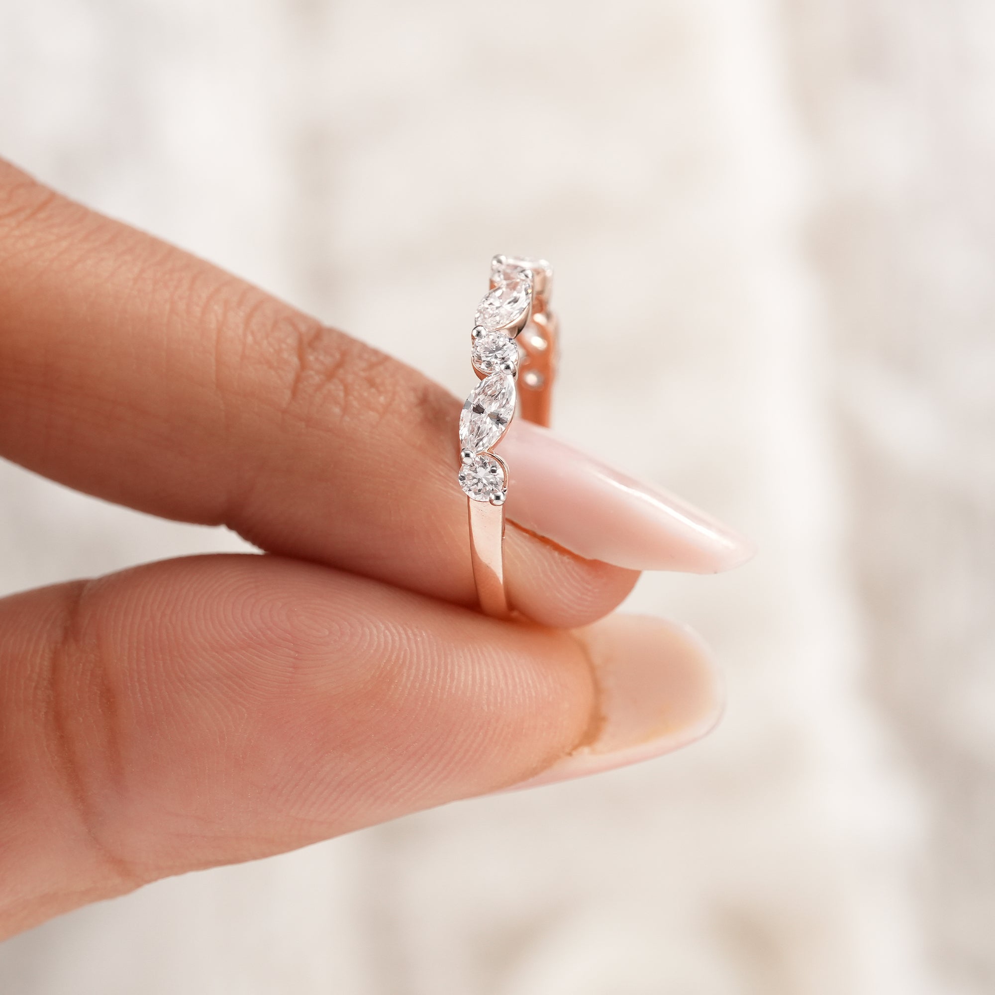 Modern marquise and round diamond anniversary band.