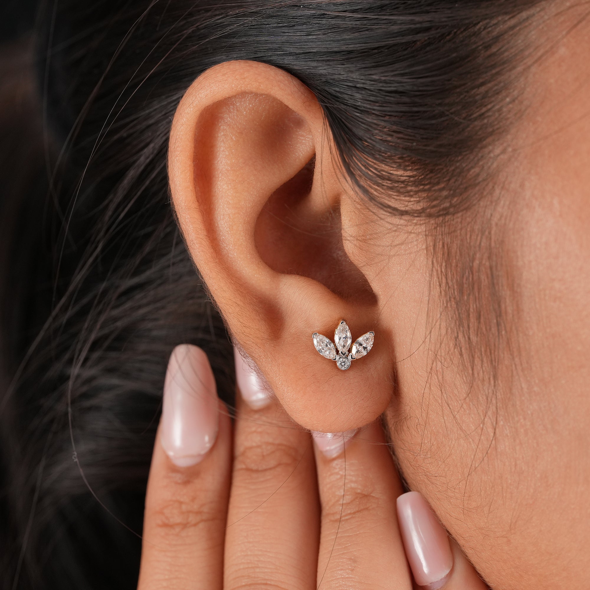 Floral diamond stud earrings featuring marquise and round lab diamonds