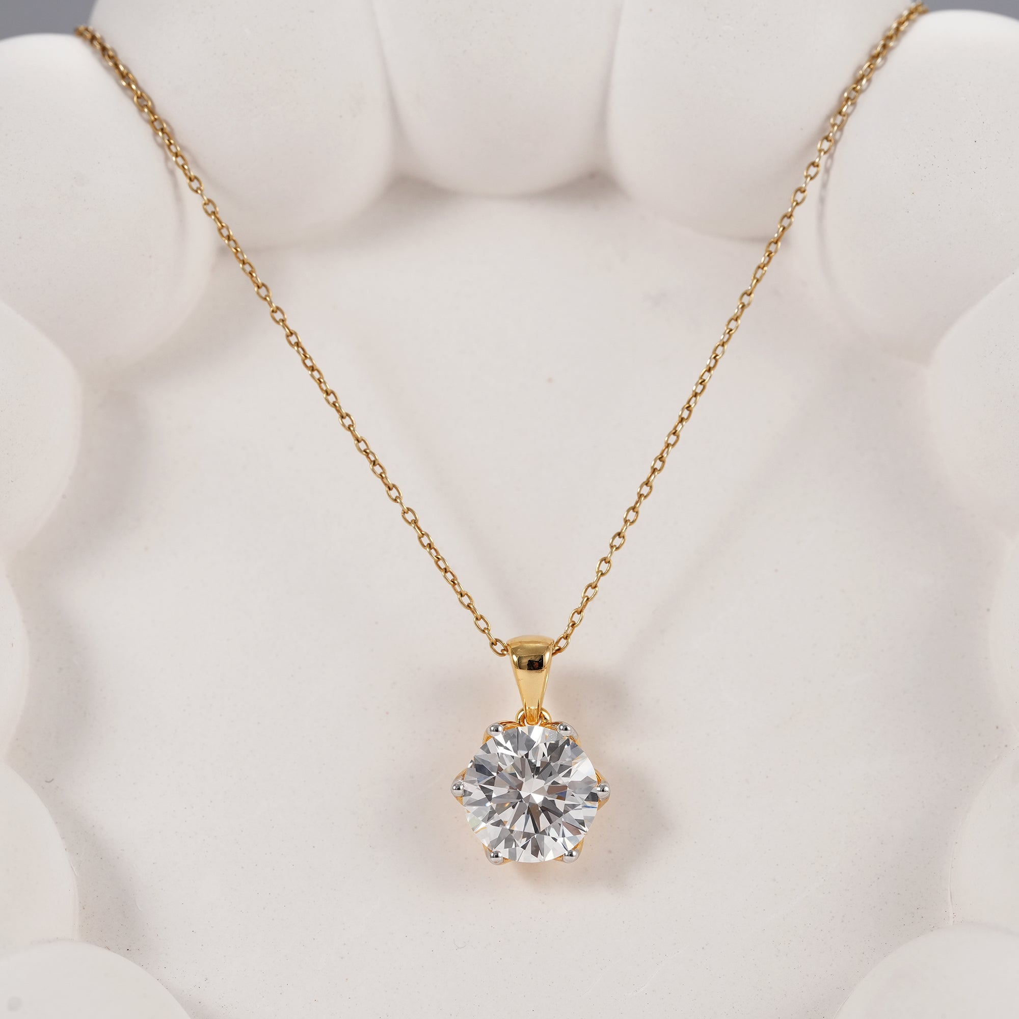 Classic round solitaire diamond pendant necklace in yellow gold