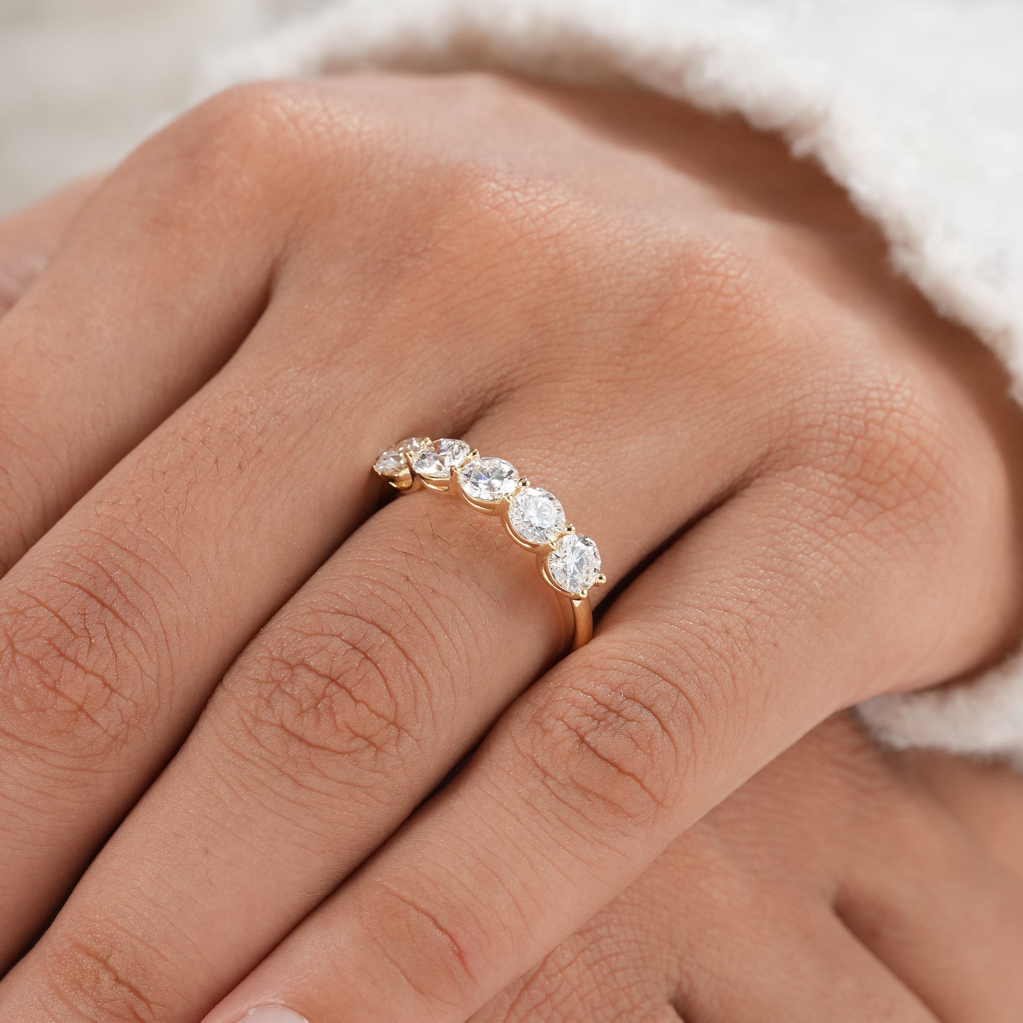 Minimalist fine jewelry lab diamond wedding ring.