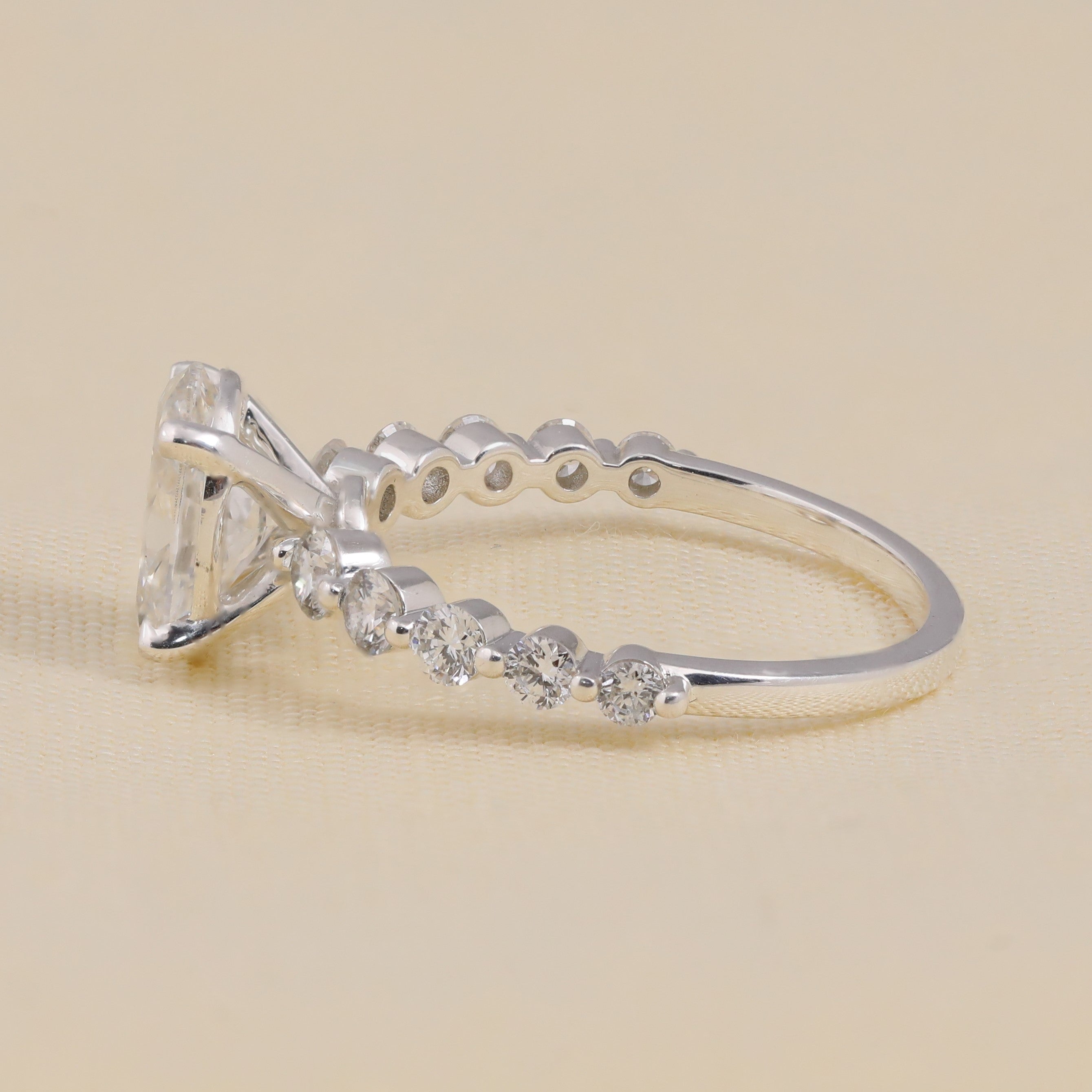 Elegant oval lab-grown diamond proposal ring with accent diamonds