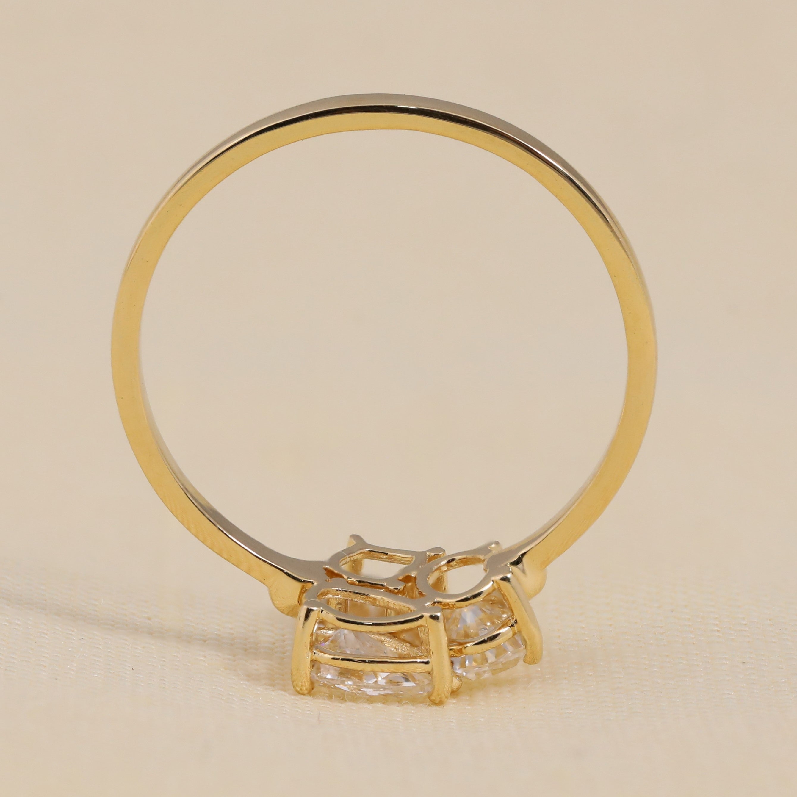 Oval lab grown diamond ring featuring artistic three-stone combination