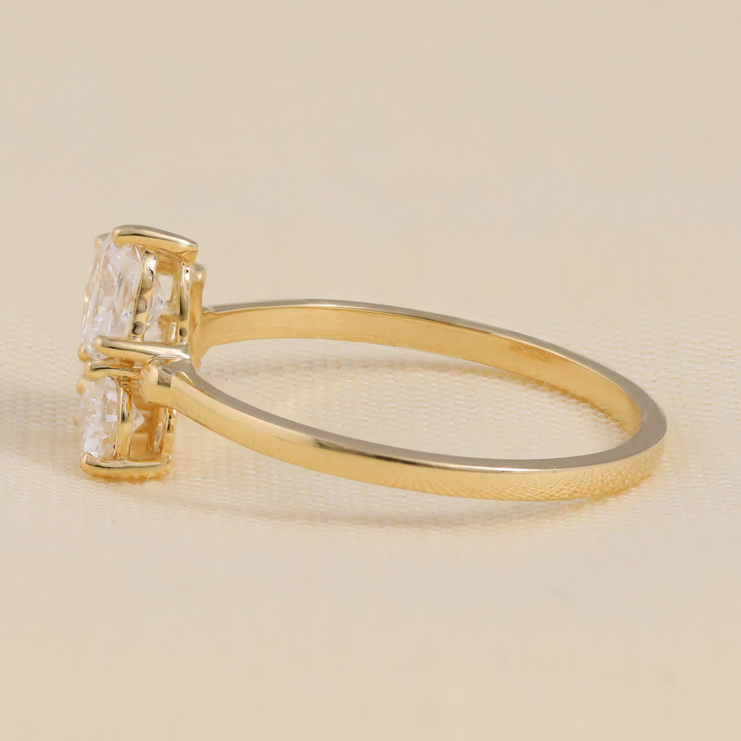 Fashion-forward oval cut lab grown diamond ring blending multiple shapes together